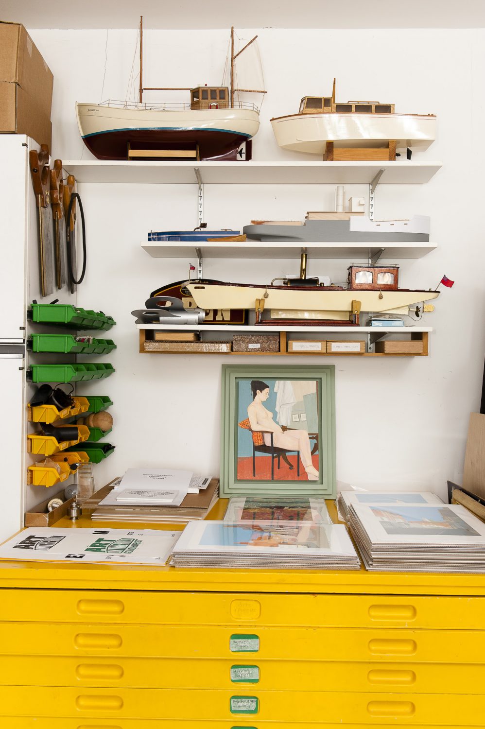 The studio is home to more of Dave's boats and a wonderful bright yellow plan chest