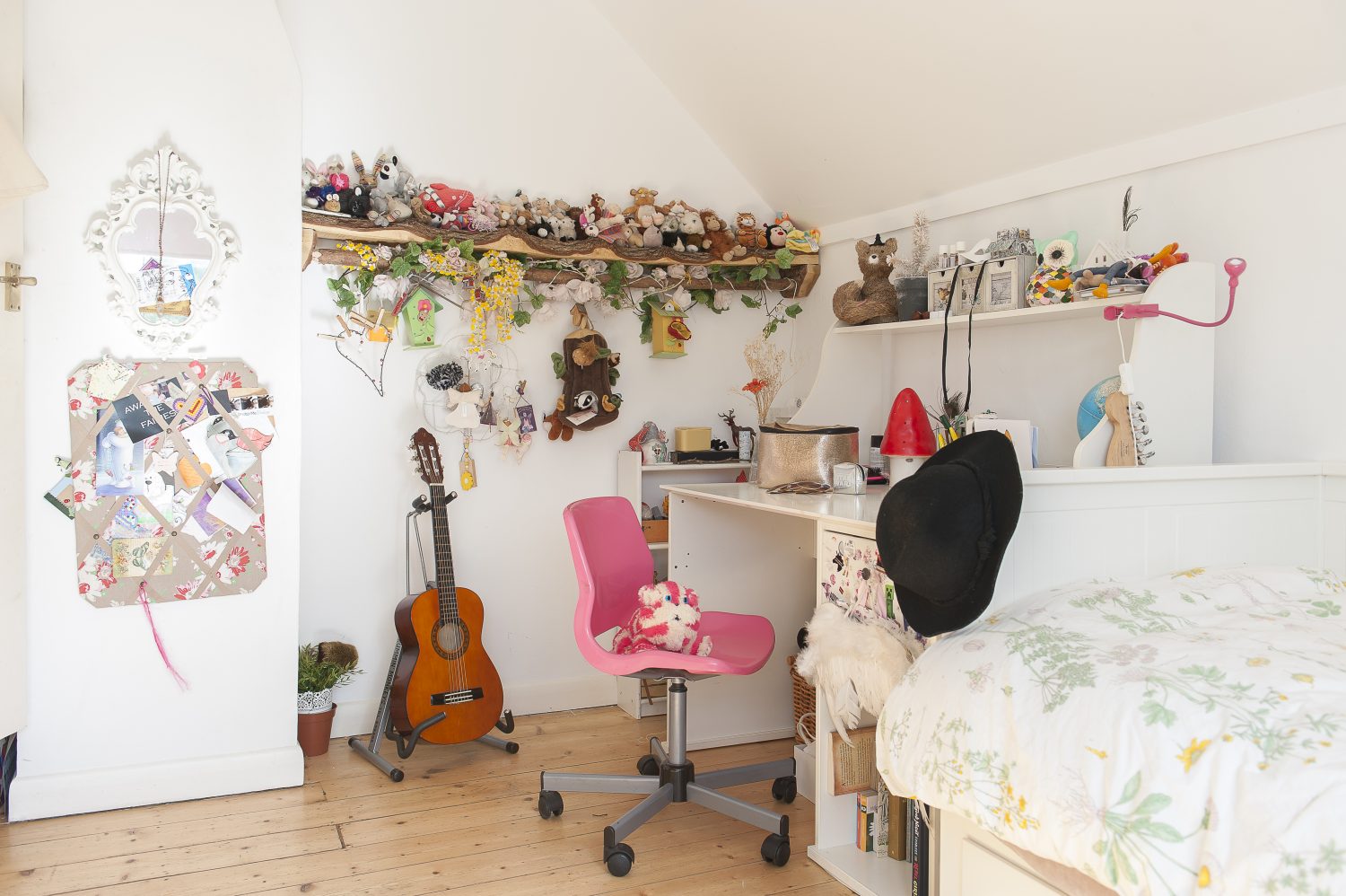 Elsie’s bedroom is pure white and is calm and tidy, save for a single rustic oak shelf packed full of teddies and toys