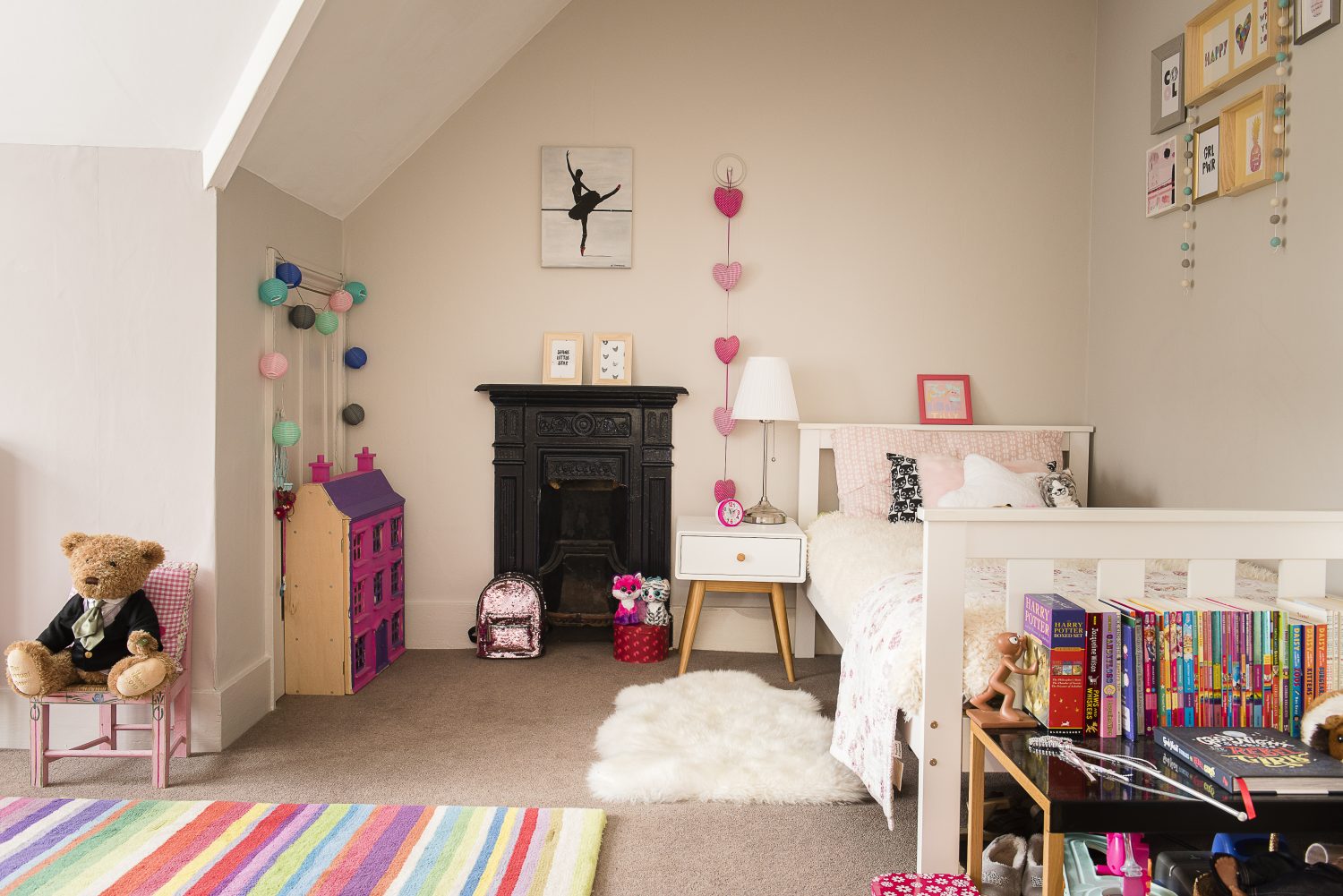 Tilly’s spacious room, at the front of the house, looks over the school playing field Left: Oscar’s room was difficult to fit furniture in because of the sloping ceiling. His bed was from Little Home children’s range by John Lewis.