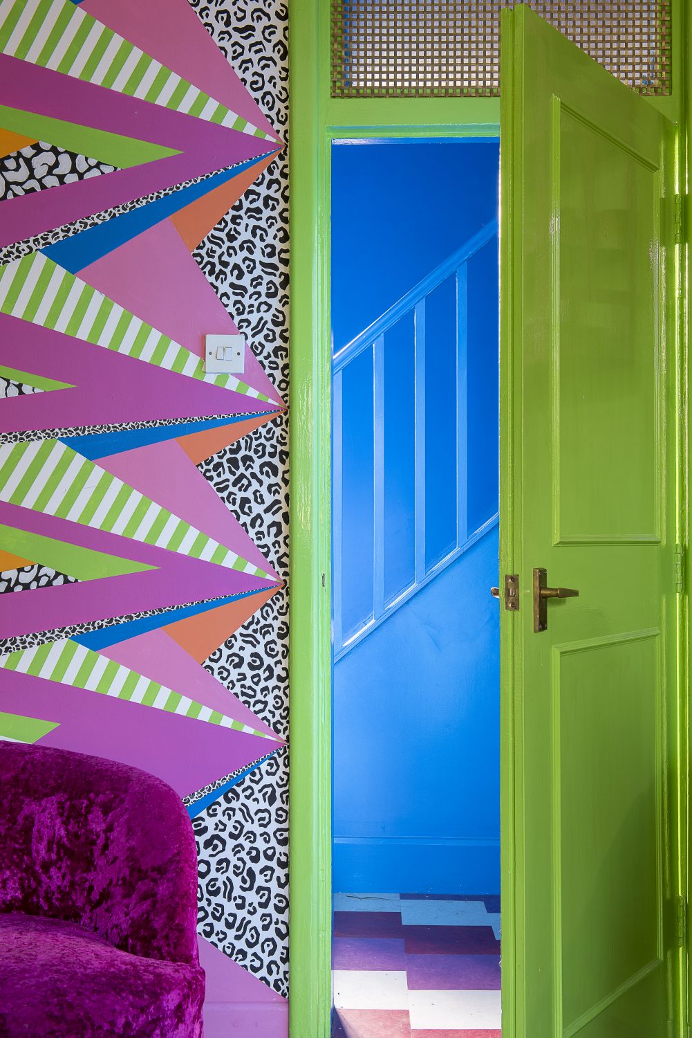 Amy has hand painted her unique and colourful designs, sourcing a good deal of her furnishings from Margate. “There’s some interesting things here. It’s quite junky and there’s a lot of mid-century stuff around the place.” The bright pink sofa came from the Yard in the Old Town