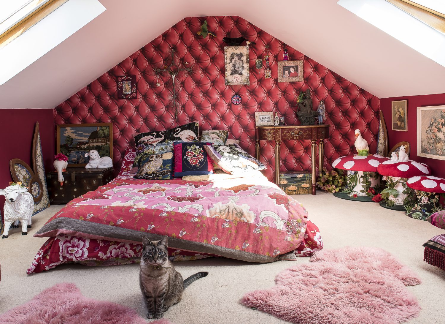 : Annemarie made the mushrooms for the attic coversion which she has recently decorated as a bedroom for her granddaughter. The wallpaper is by Couture Deco. Doris the cat stands guard