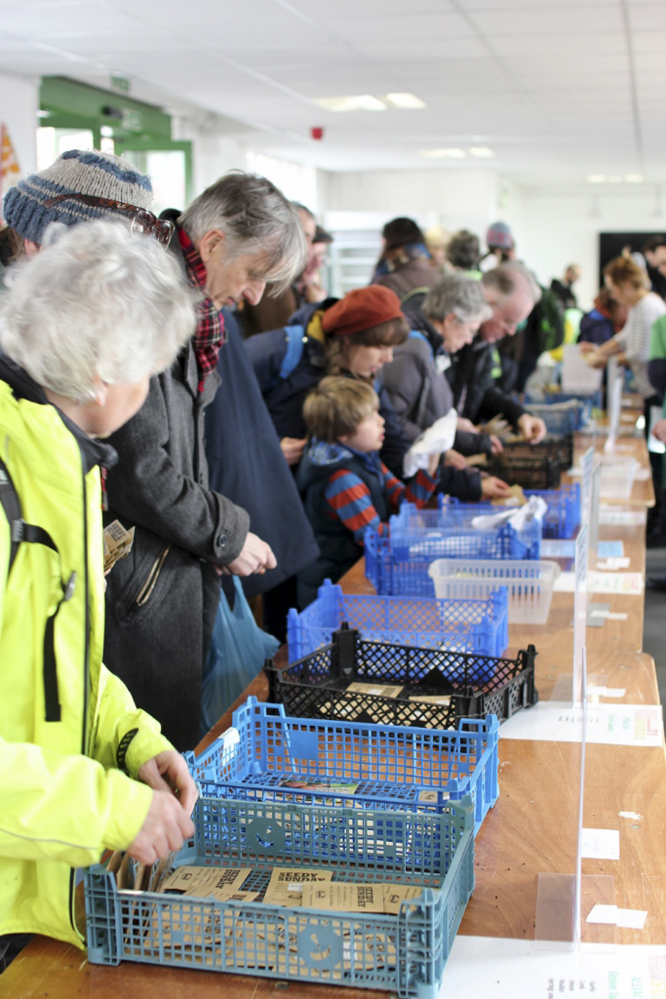 Keen seed swappers and hunters at Brighton’s Seedy Sunday, the longest running seed swap in Britain