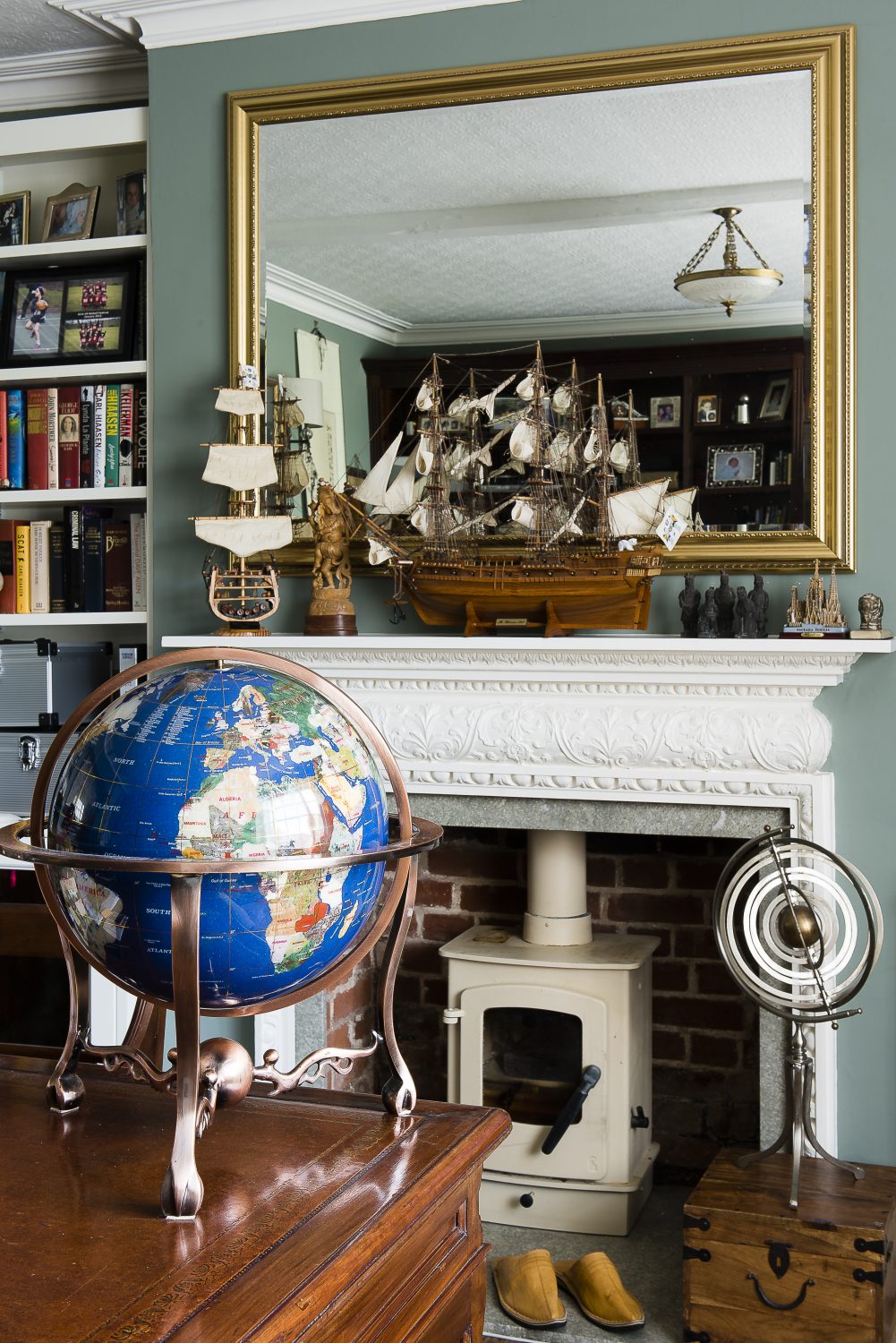 In Gerry's study, the model ships were boughts by the couple on their honeymoon. The globe is from Florida