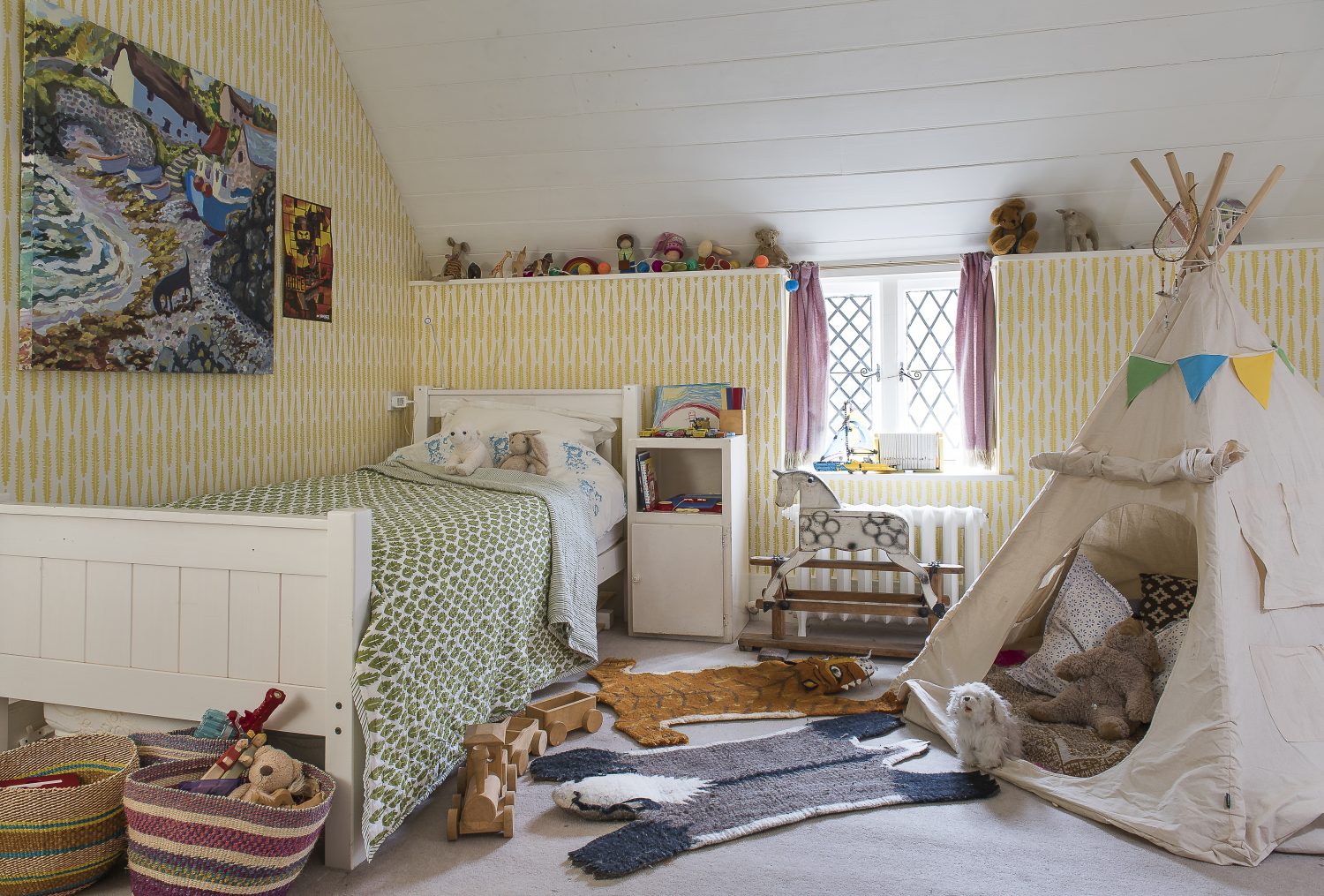Youngest child, Orlando’s bedroom. The wallpaper is Fern. The quilt is also by Molly Mahon
