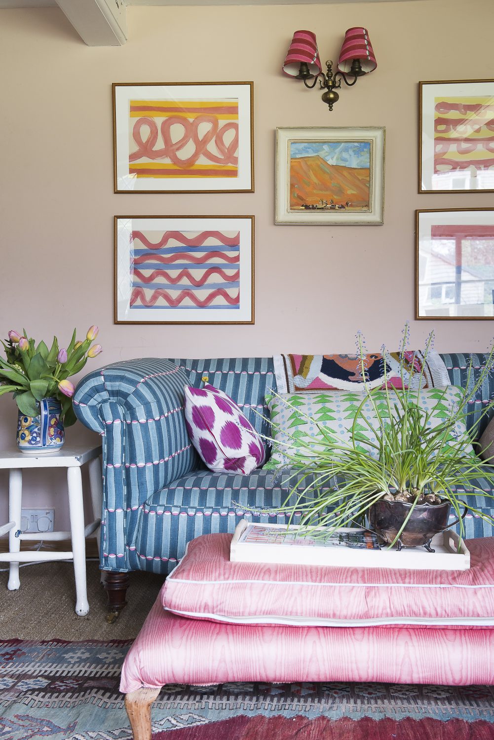 The sofa in the sitting room is covered in Molly’s award-winning Luna fabric