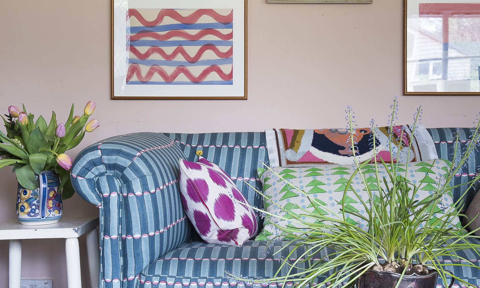 The sofa in the sitting room is covered in Molly’s award-winning Luna fabric