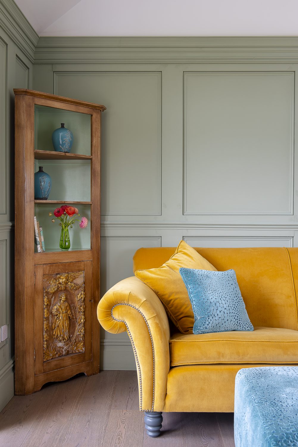 The holiday let’s sitting room, in the third wing of the house, features panelling designed by Susie