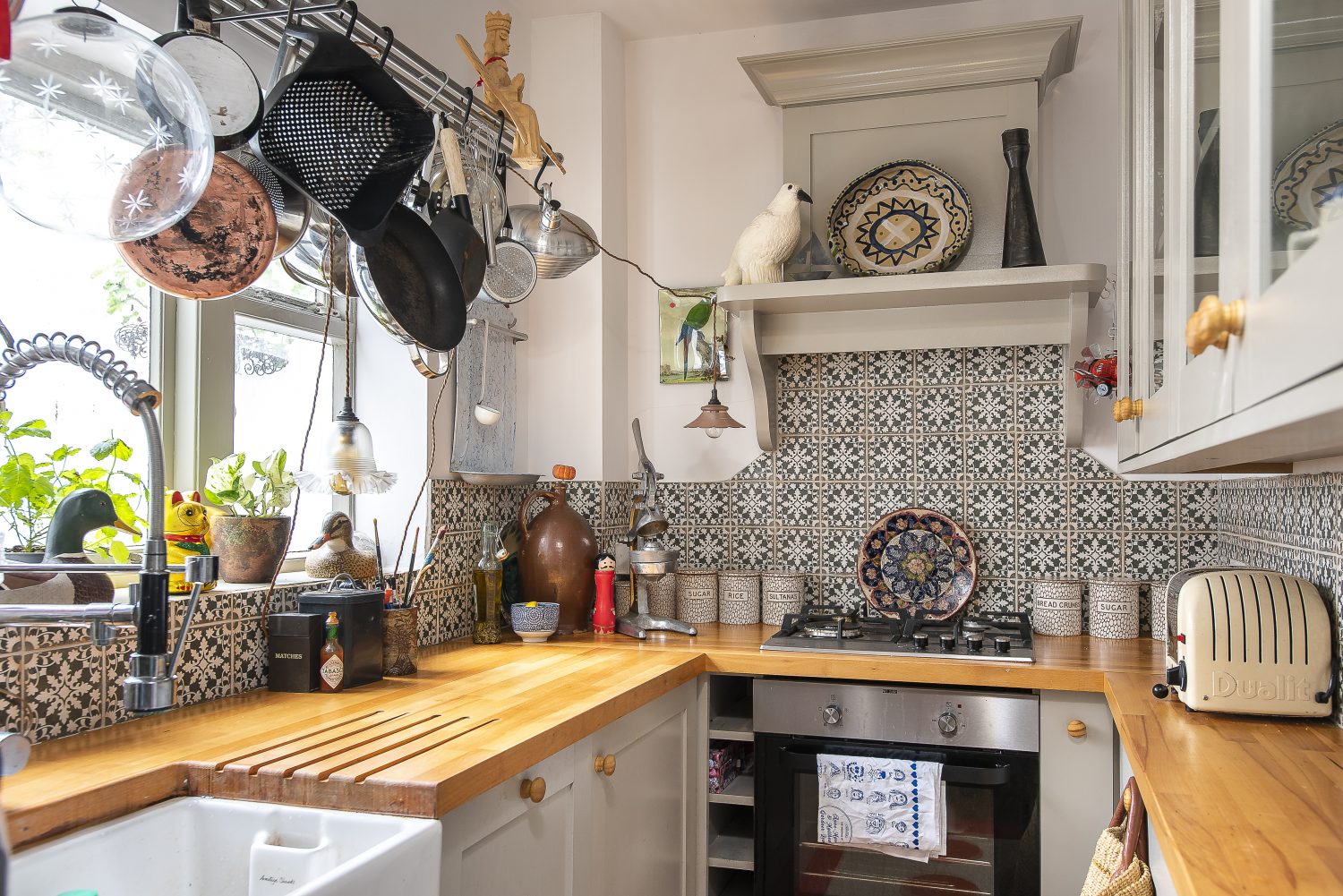 In the kitchen, Sally has found room to pack in plenty of her magical objects, including some lifesize wooden ducks and a large metal orange squeezer, that she brought back from Mexico