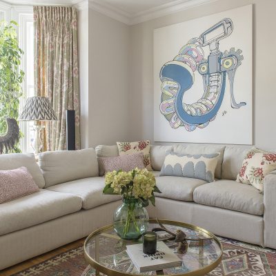 Pale blues and pinks that feature in a corkscrew print by London artist Tommy Penton in the sitting room are picked out in the room’s soft furnishings. The cushions are from the Haines Collection and Fox Murray Home – a local lady who makes amazing, huge wool cushions