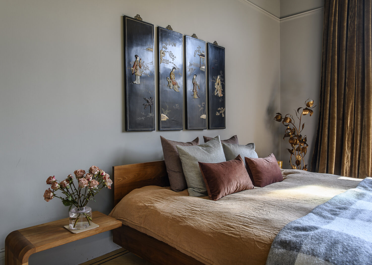 In the main bedroom handmade velvet curtains, and bespoke and vintage furniture that nod to the family’s Antipodean roots, have all been sourced in a palette of calming tones