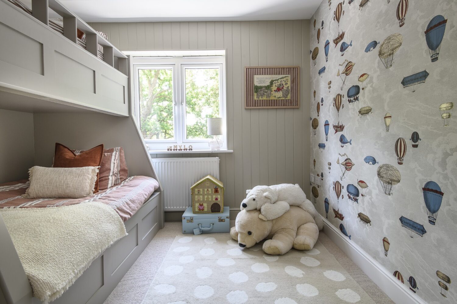 The wallpaper (‘Macchine Volanti’ from Cole & Son) was selected to see the boys through to the teenage years.
