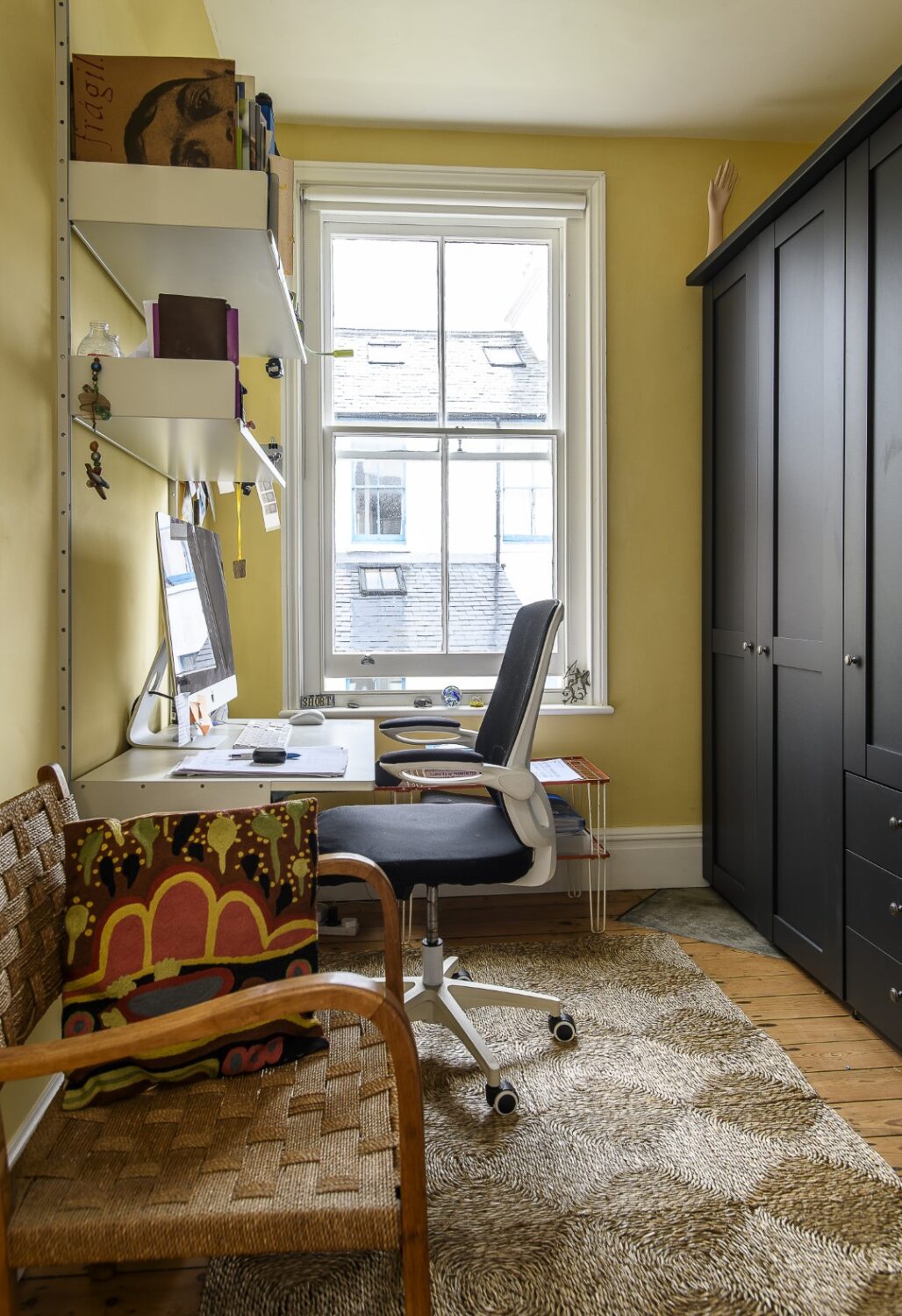what was once a dark second bedroom is now a bright office. “We like things that are curious, or odd. Our collection is full of surprises and not all of them are pretty,” says David