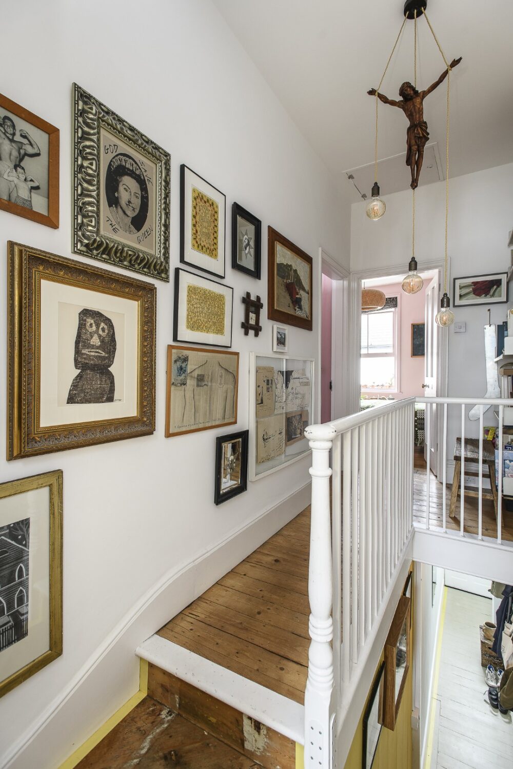 On the first floor, up the staircase lined with prints, paintings, drawings and curios