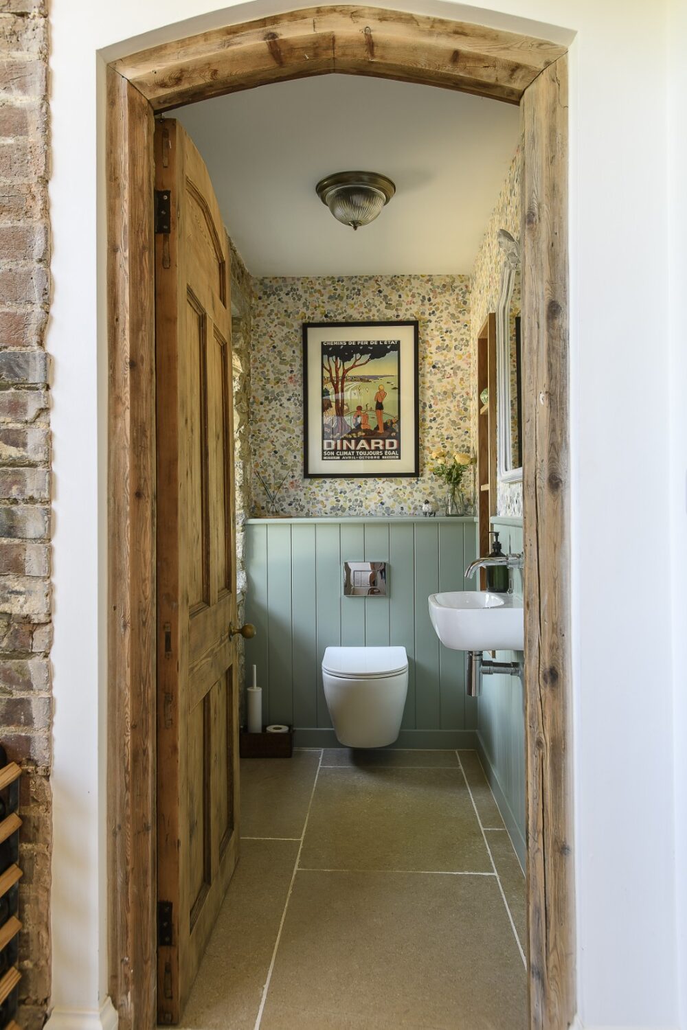 The downstairs loo, papered in Dapple Wallpaper from John Lewis