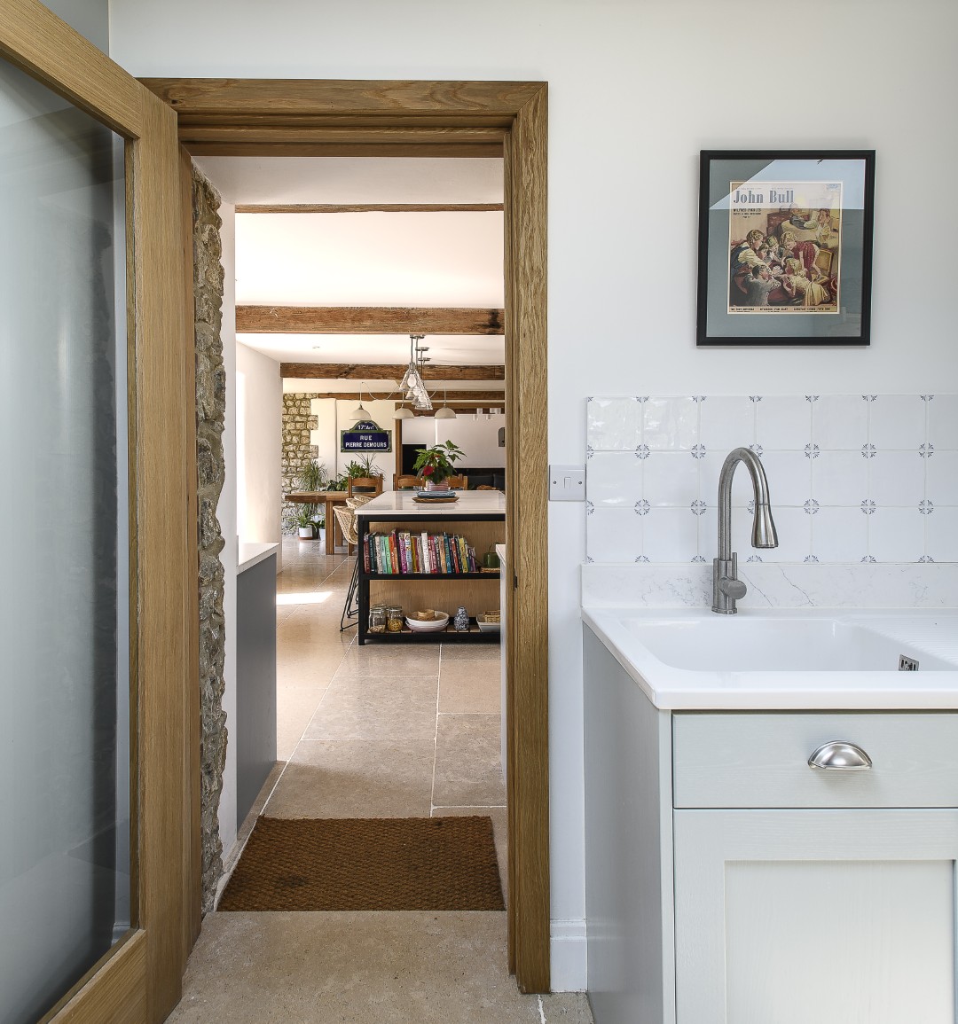 The utility room leads through to an office space