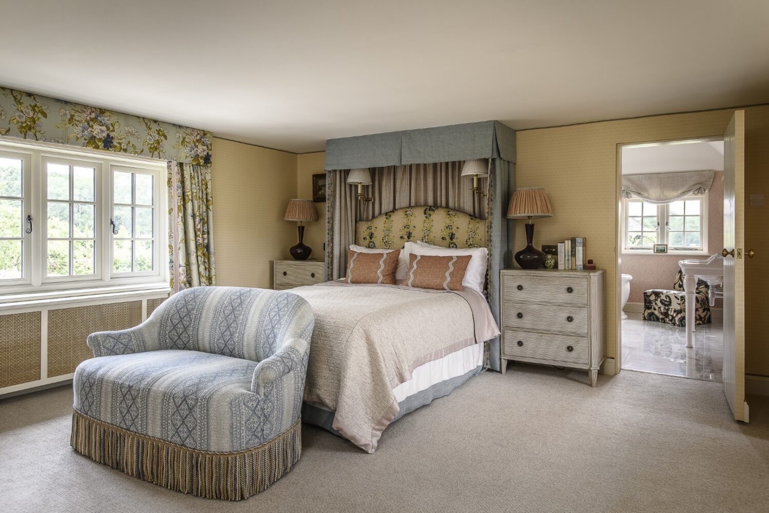 Due to the ceiling height, a four-poster bed couldn’t be included in the principal bedroom’s new look. “So I suggested a half tester. It makes a real focal point to the space – it’s the first thing you see.”