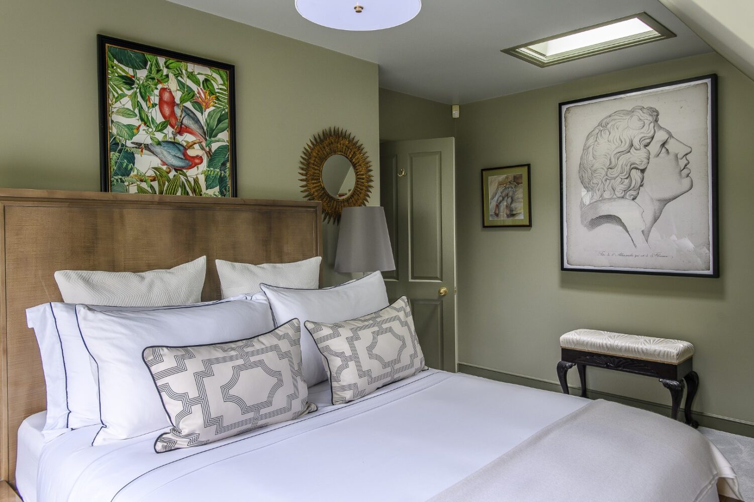 Each guest bedroom has its own personality. Throughout, vintage finds are mixed with modern pieces, by the likes of Jonathan Adler, and bespoke upholstery