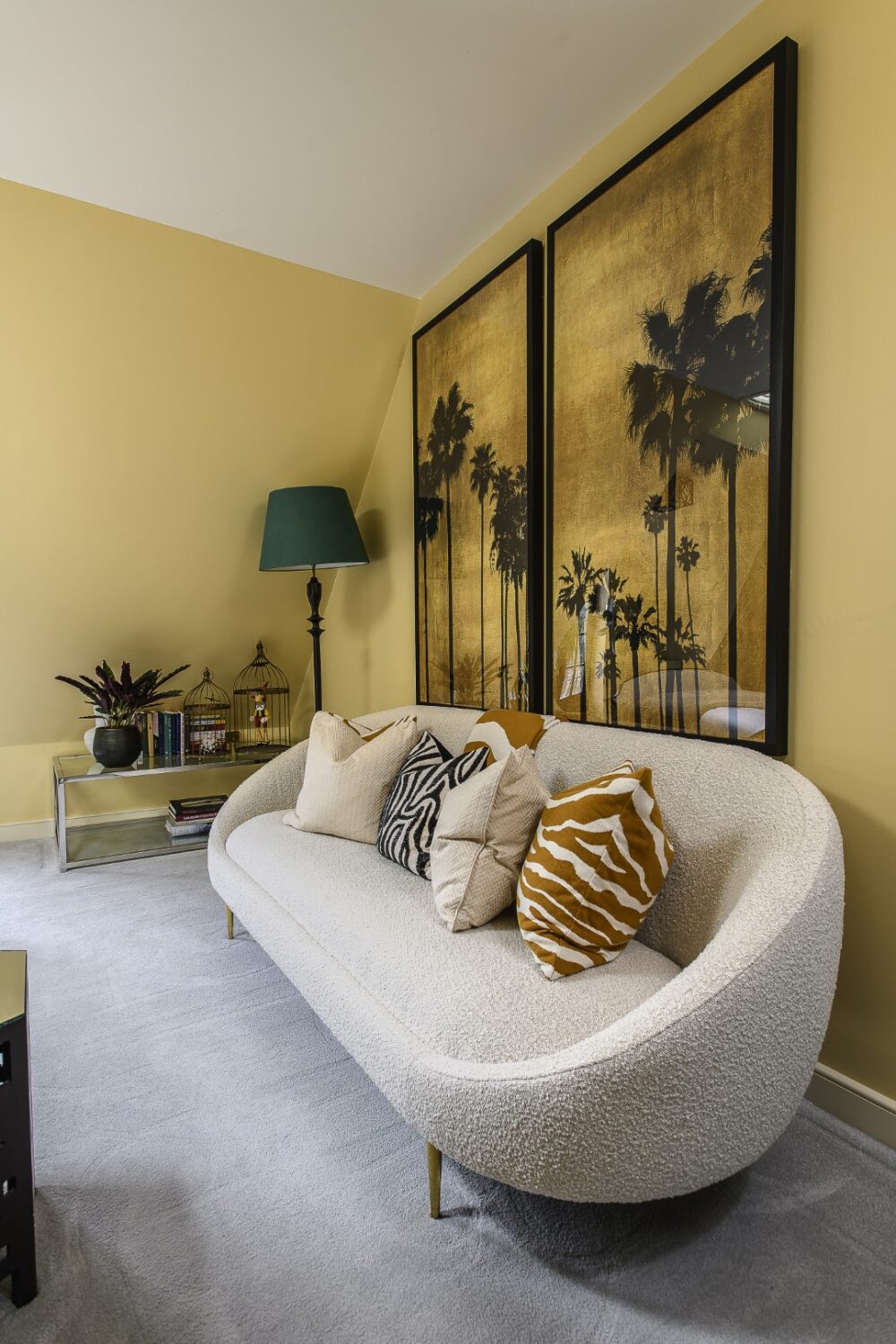 The ‘Hollywood Room’ pairs black and gold with palm tree artworks for a glamorous, Deco-inspired feel