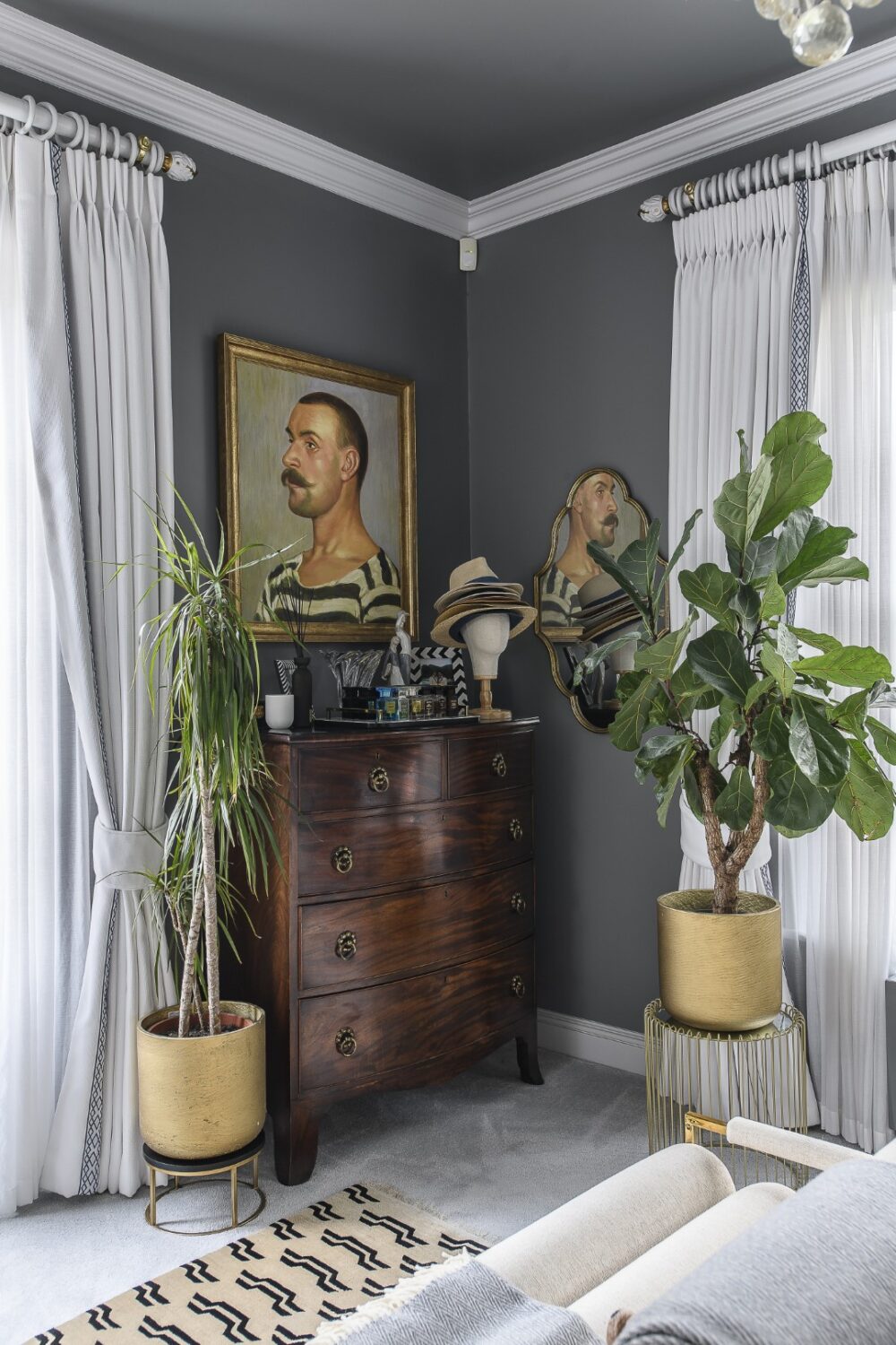 Sean’s bedroom, on the ground floor, features a geometric Hästens headboard and a colour scheme of soothing tonal greys and blues.