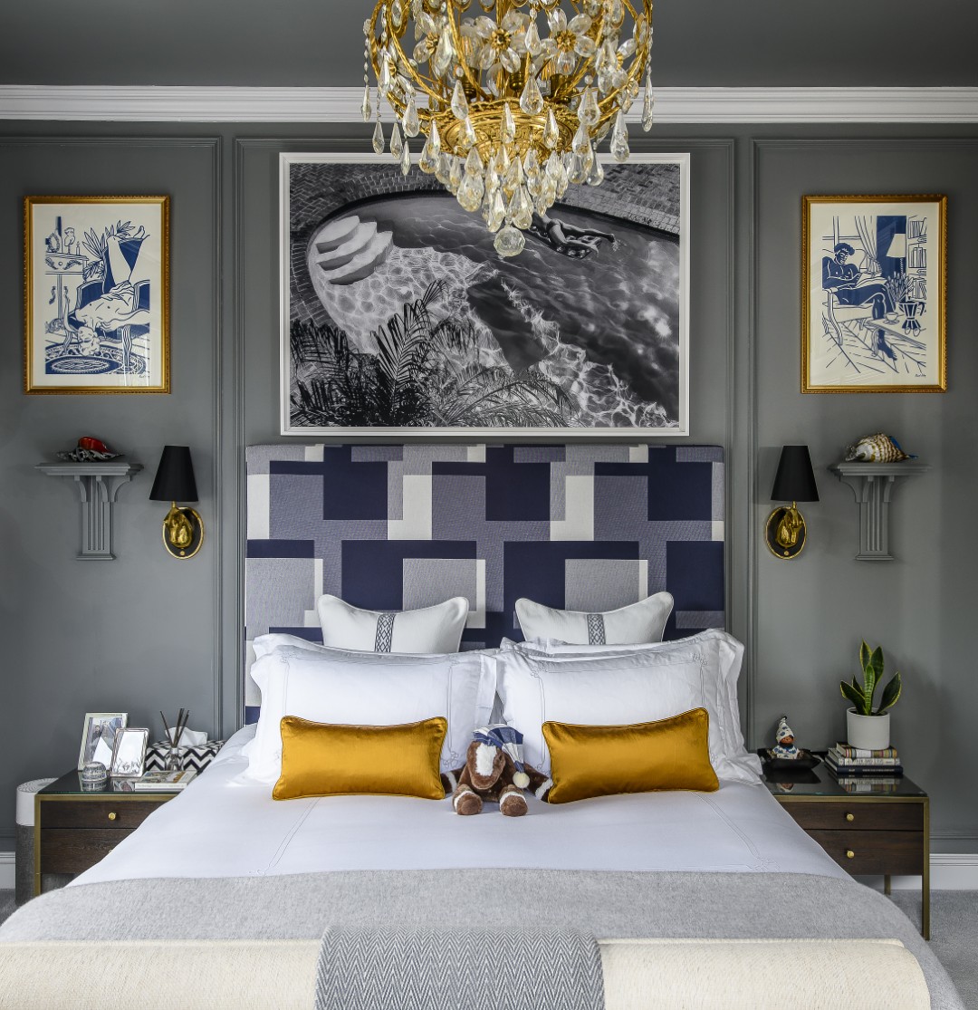 Sean’s bedroom, on the ground floor, features a geometric Hästens headboard and a colour scheme of soothing tonal greys and blues.
