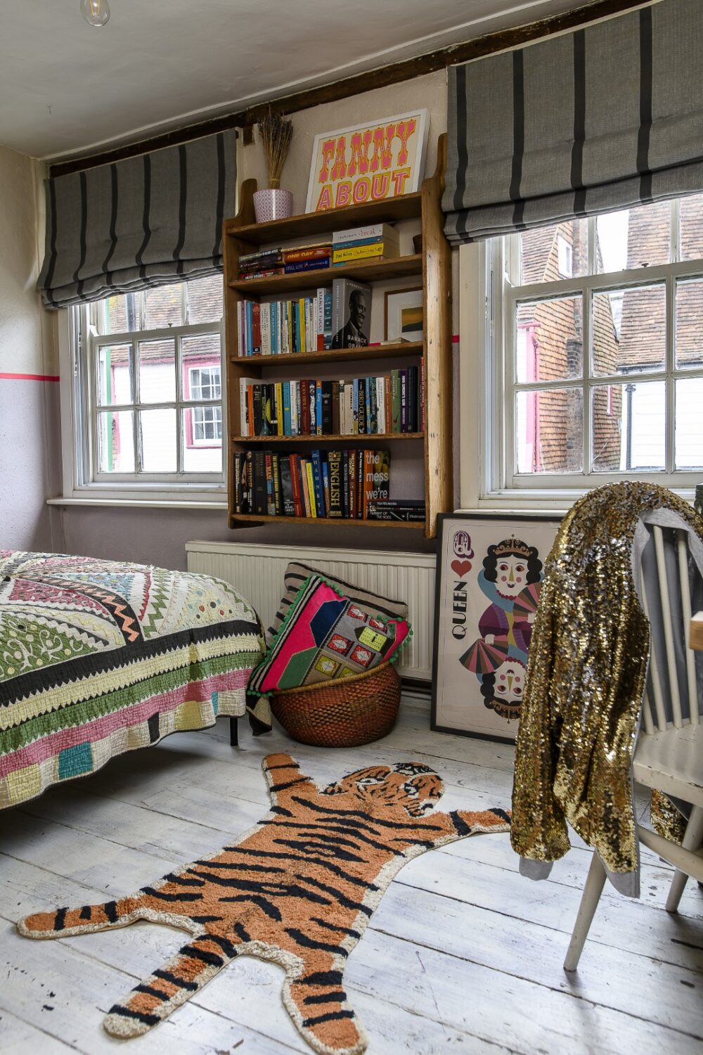 Upstairs, the bedrooms and bathrooms continue to reveal Tam’s love of colour and print with pops of green, yellow, neon pink and orange across cushions and throws and, of course, the artwork that she has collected from the likes of Mandy Doubt, Margo in Margate, Tabby Booth, Dandy Star, Lucky Budgie and Petra Boase