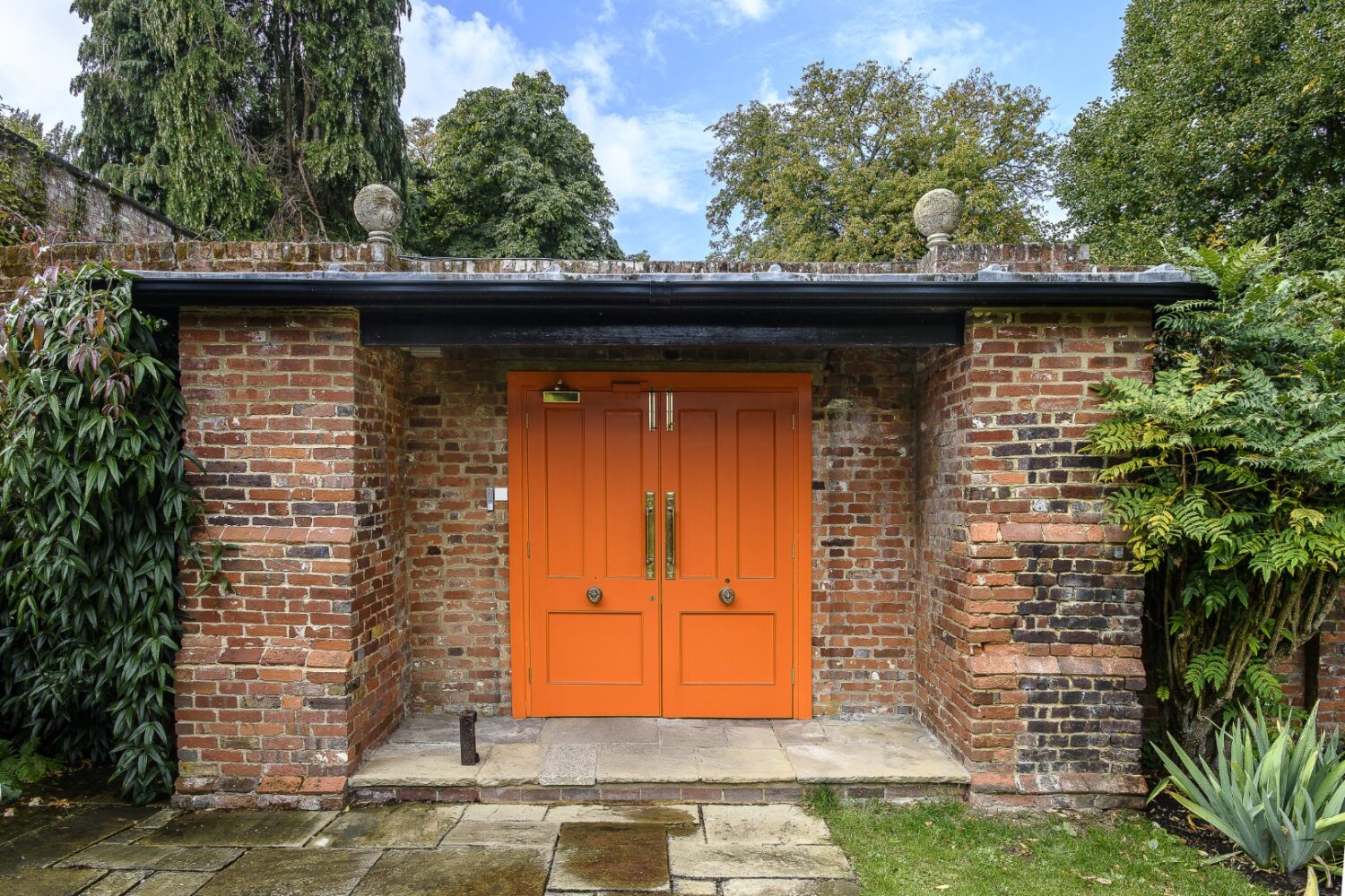 The Dower House’s memorable entrance is painted in a custom colour that Sean had mixed