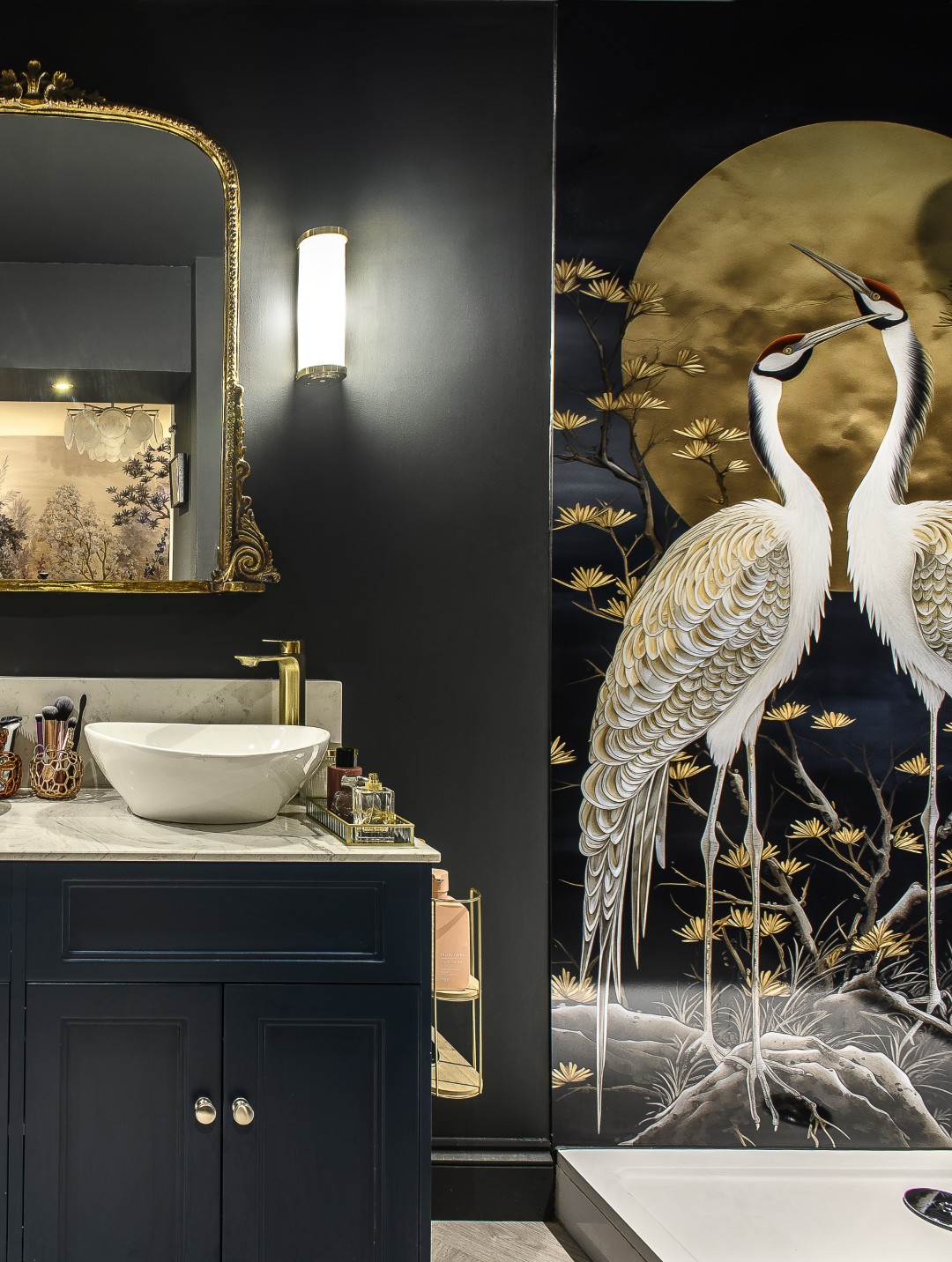 Doors in Tania’s bedroom, which look like a run of wardrobes, open to reveal her stunning en suite shower room