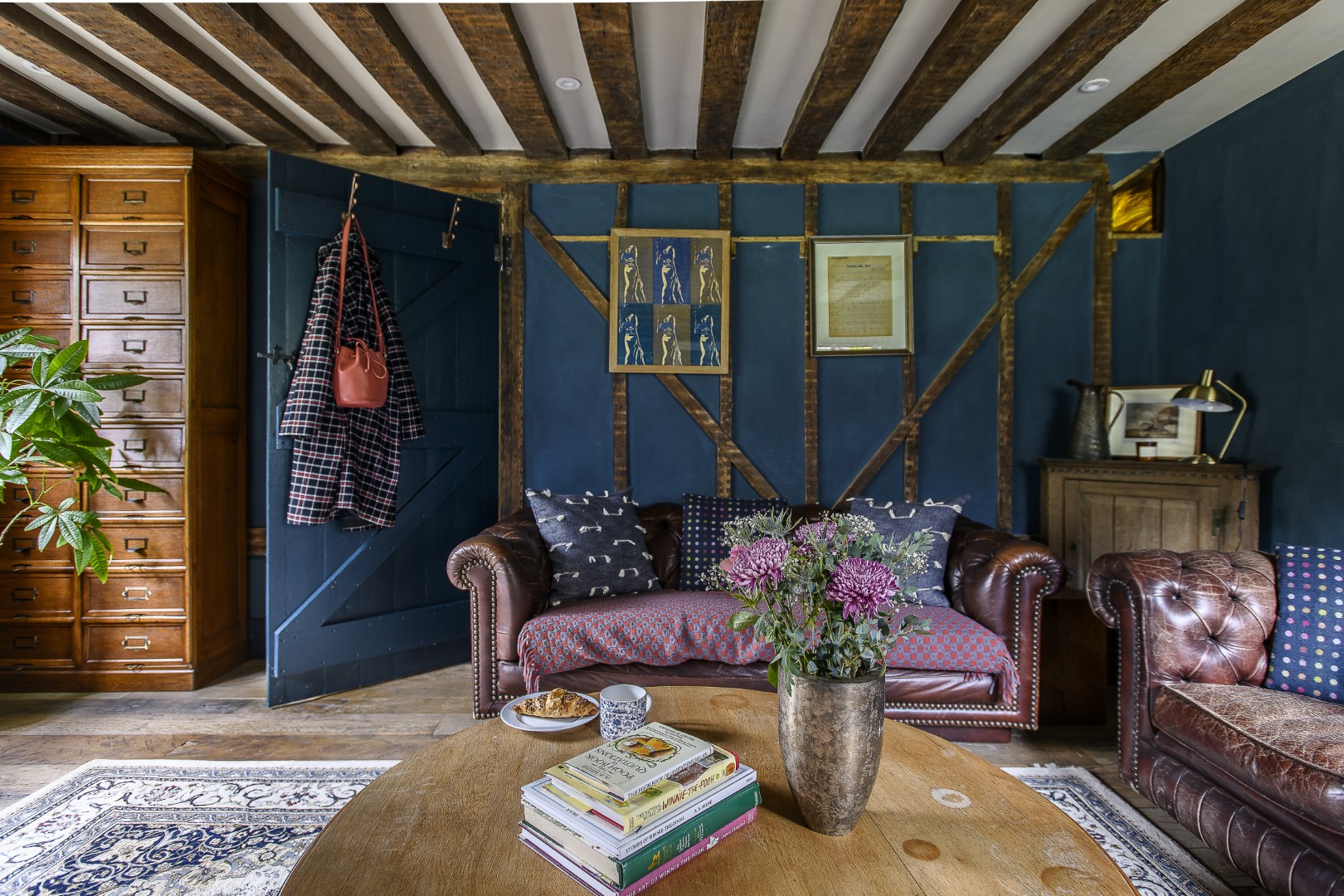 The impressive oak panelled dining room is perfect for family gatherings