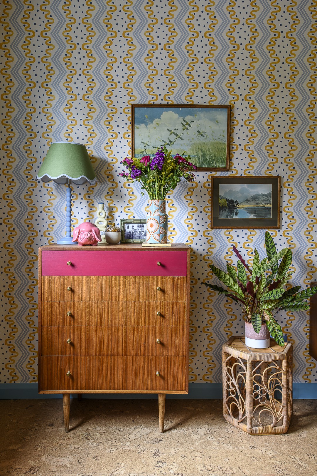 Throughout the house, midcentury furniture has been brought to life with playful pops of colour. 