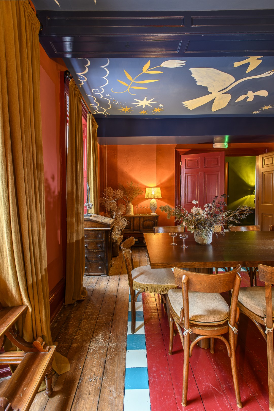 The Private Dining Room features a ceiling mural painted by Chiara Perano, an artist based in East Sussex