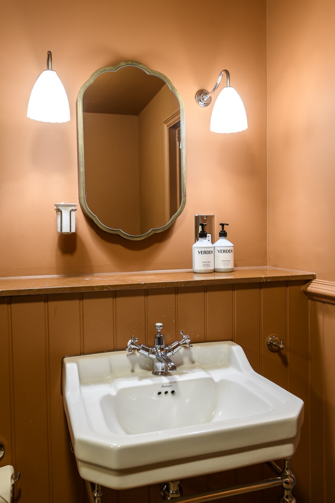 The softly lit and spacious Junior suite has views out over the lawn, towards the lake