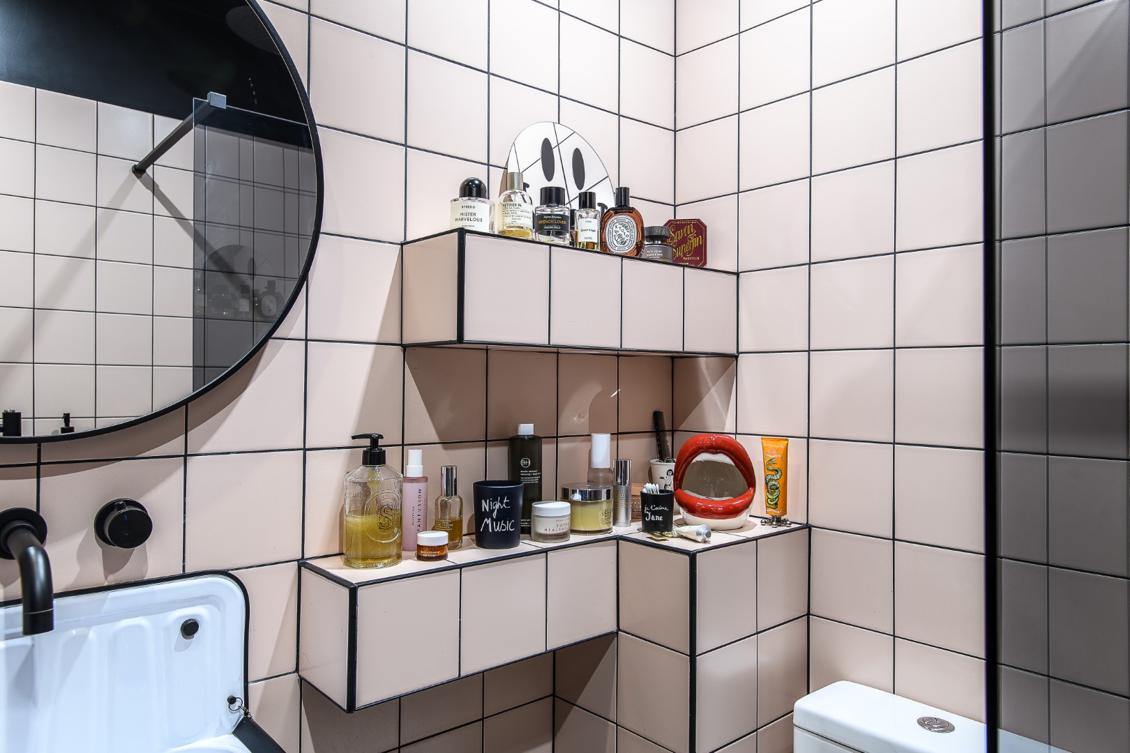 The blush pink en suite is stocked with his favourite fragrances and toiletries