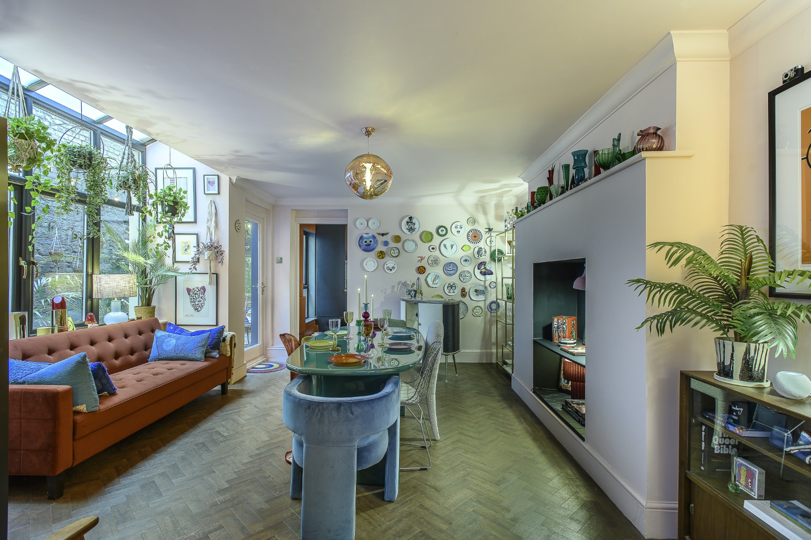 In the dining room, Dulux Berry Whip absorbs the light and gives a powdery feel. There’s a mix of vintage and new, finds from Matt’s travels near and far. An assortment of seating, glass and dinnerware add an irresistible feel of whimsy.