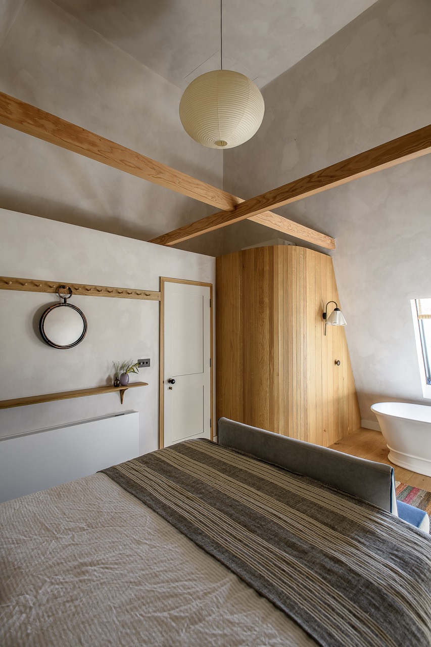 The low ceiling was removed to expose the entirety of the soaring square kiln.