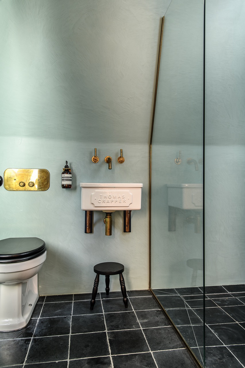 Bathrooms throughout the house are carefully considered, uncluttered spaces with luxe finishes and texture and interest provided by mixing a variety of tile materials and patterns