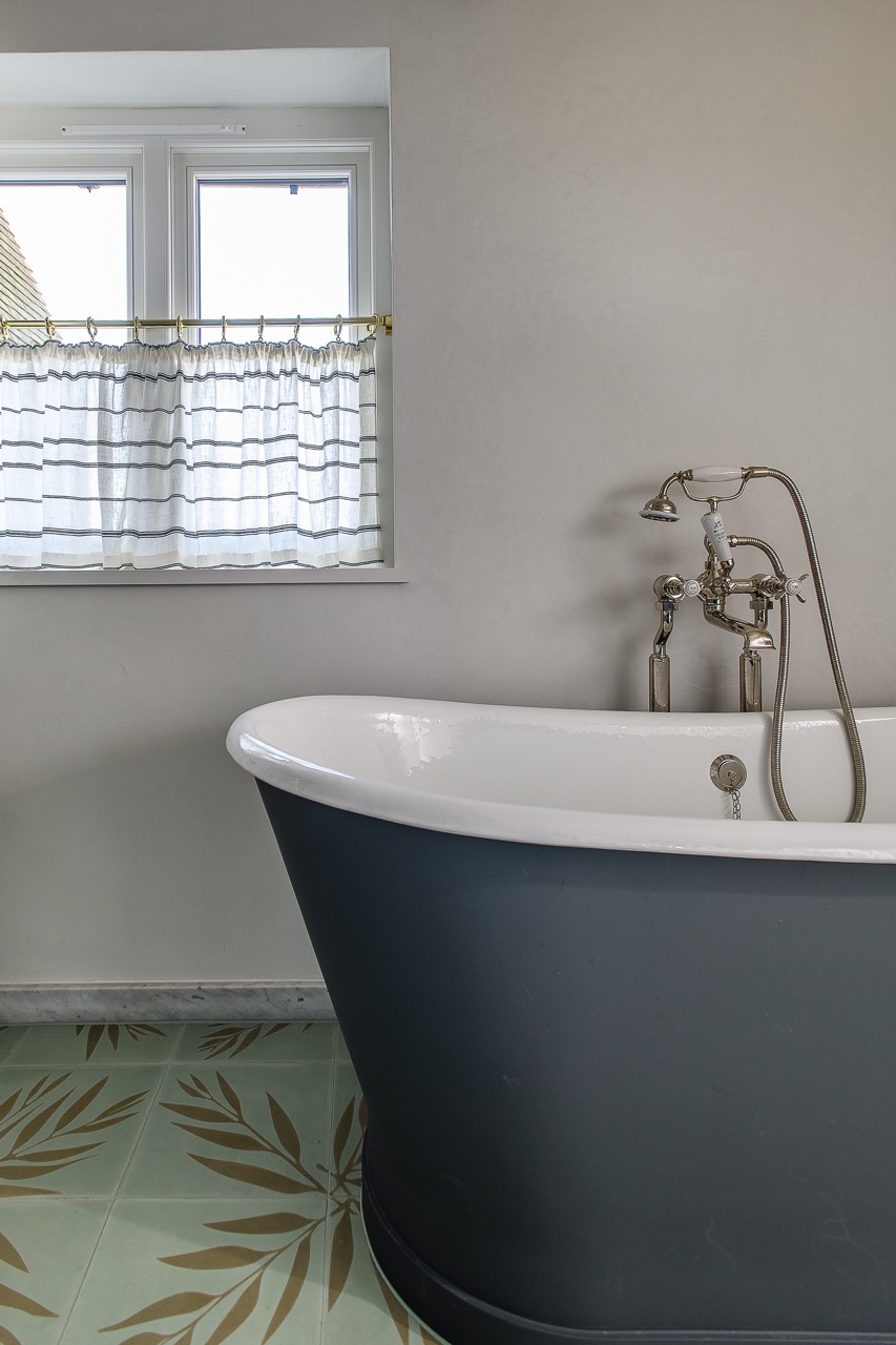 Bathrooms throughout the house are carefully considered, uncluttered spaces with luxe finishes and texture and interest provided by mixing a variety of tile materials and patterns