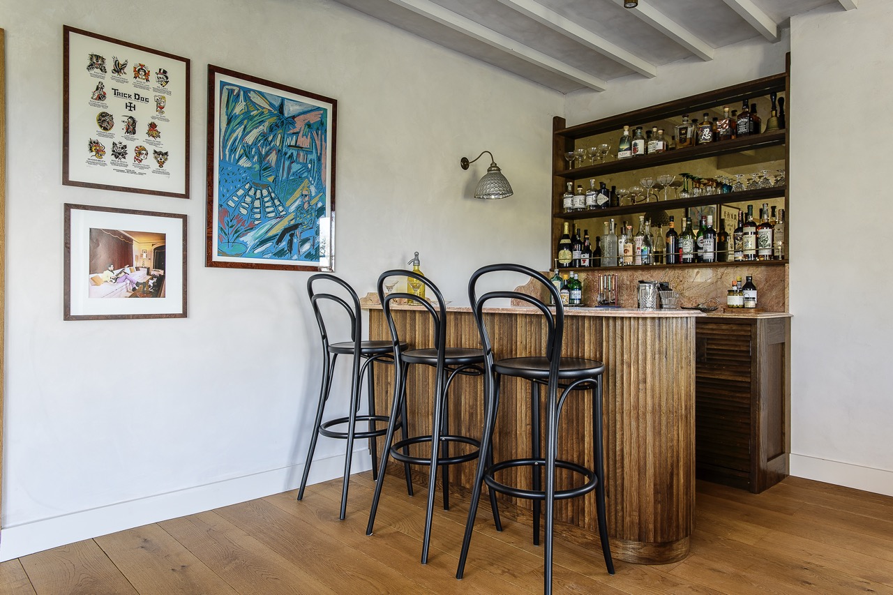 A beautifully crafted bar now resides within the sitting room of the oast. Made by Ben Wheeler of Dering Studio, based out of their workshop at Godinton House, Ashford, it is both a focal point and an invitation.