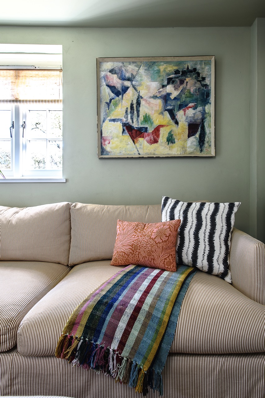 A painting above the sofa which Lucy found on eBay