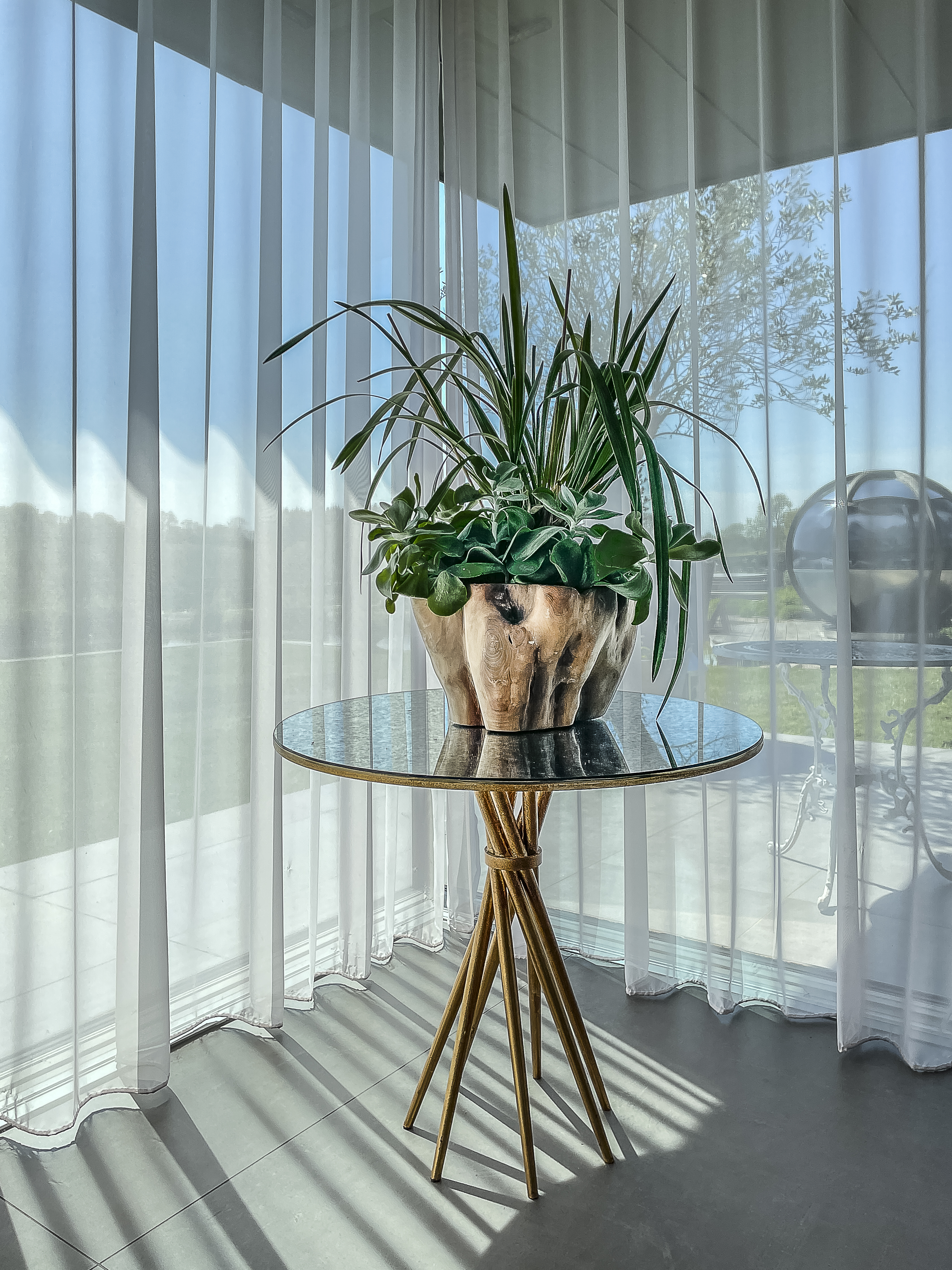A small side table in the sitting room