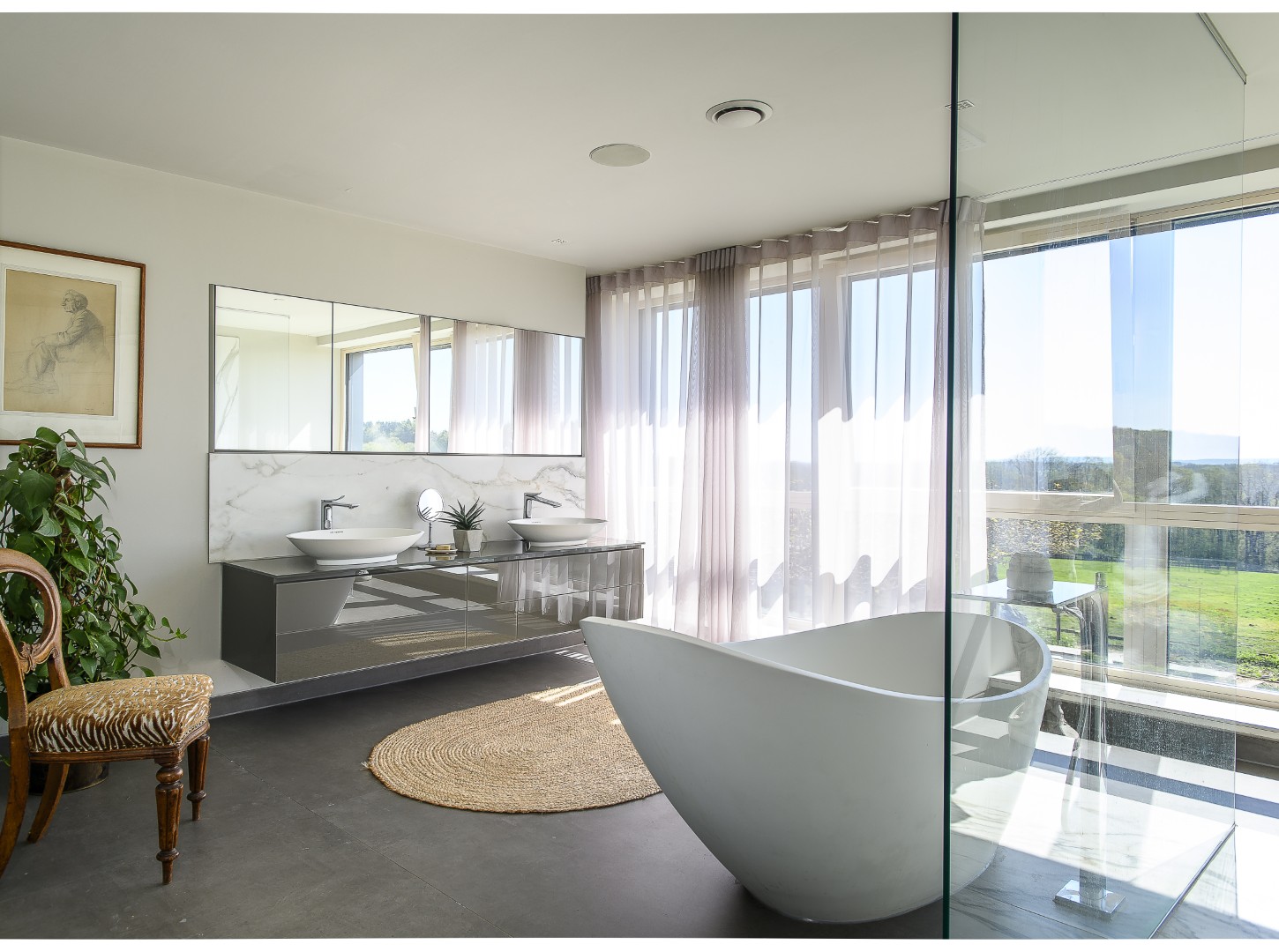 The bathrooms, with fittings from CP Hart, introduce a subtle note of understated luxury.