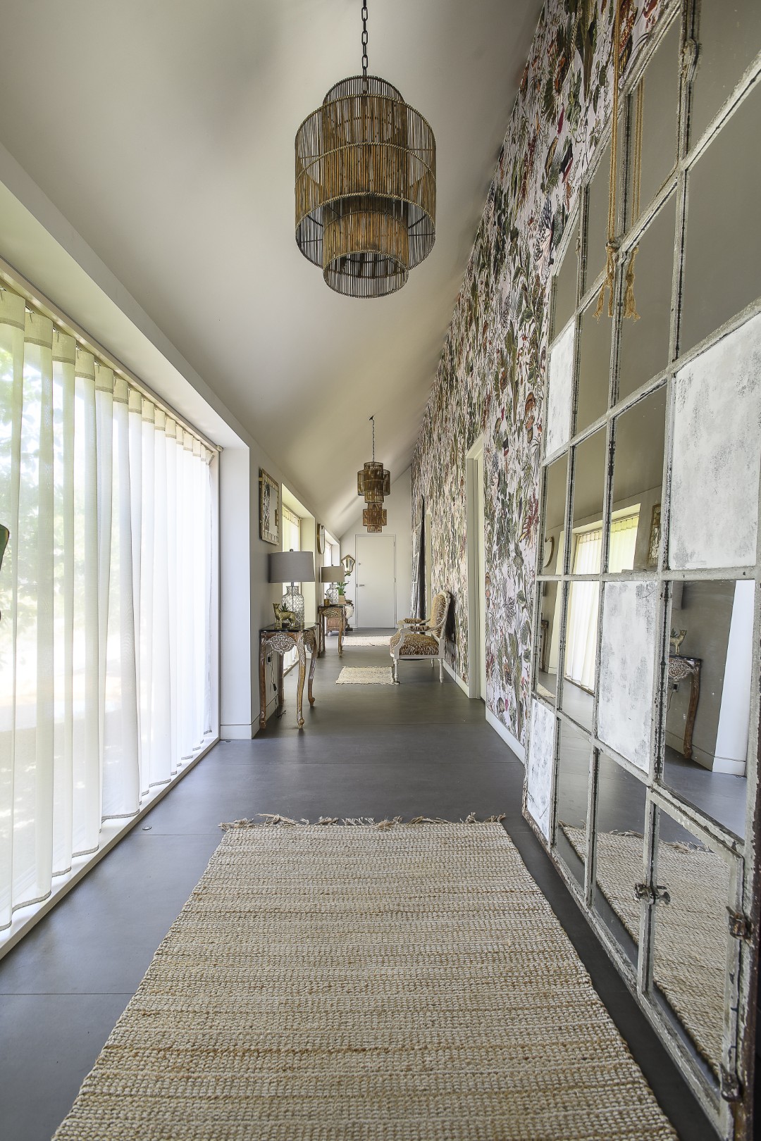A few steps from the kitchen and dining area lead up to two ground floor guest suites