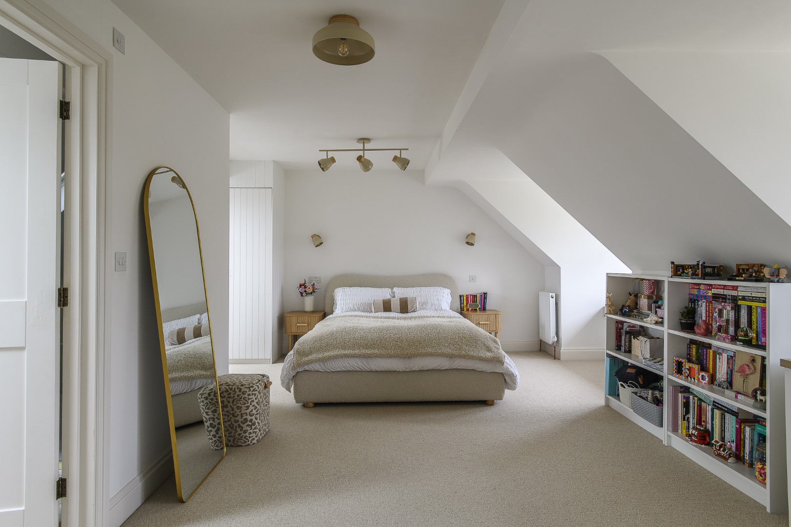 At the top of the house, Amie and Jon’s daughter’s room is a light and private space where the colour palette has been kept soft and Scandinavian-inspired.