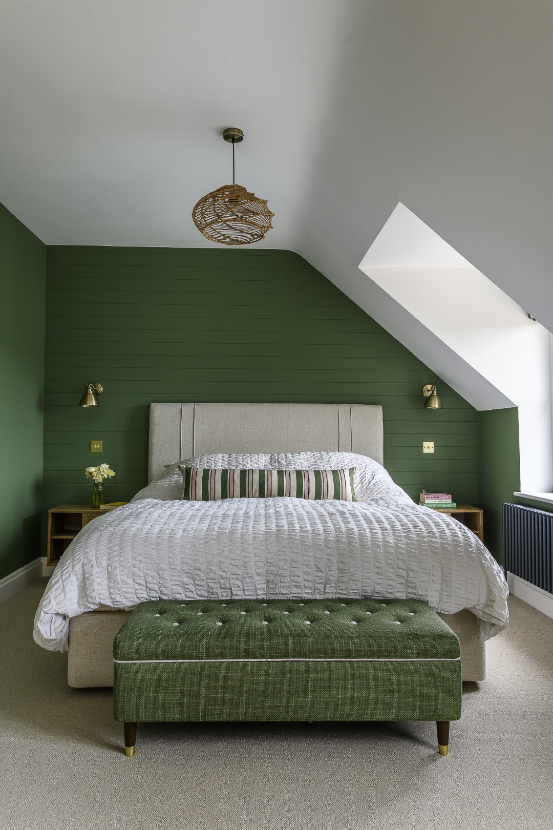 Farrow & Ball’s Calke Green provides a rich, cocooning backdrop for the bedroom