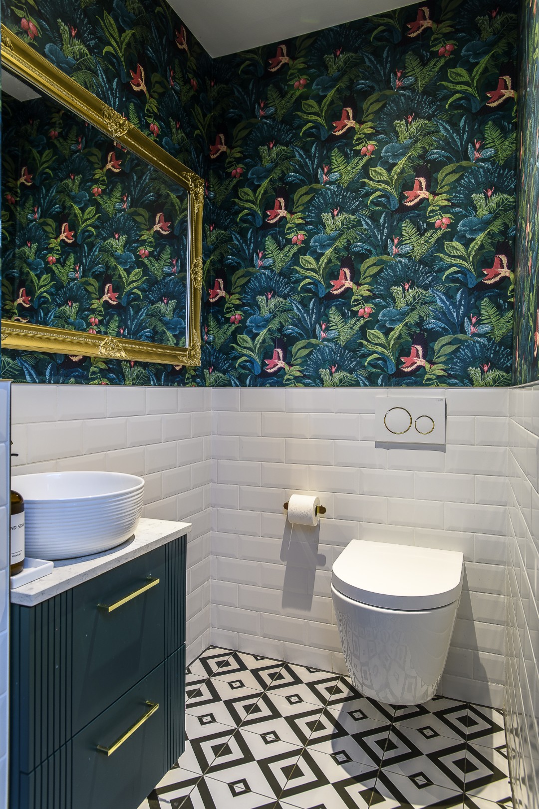 The downstairs loo is papered in Rasch Portfolio Tropical Rainforest