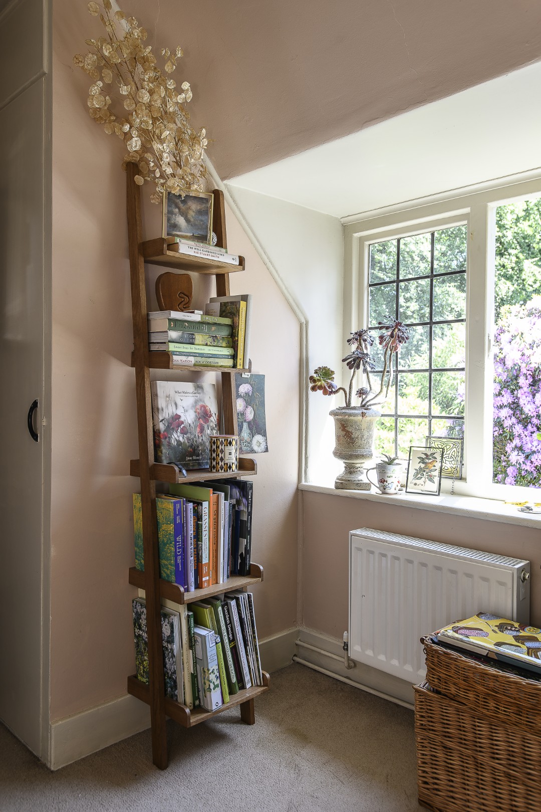 Right at the top of the house, the guest bedroom doubles up as Aga’s office