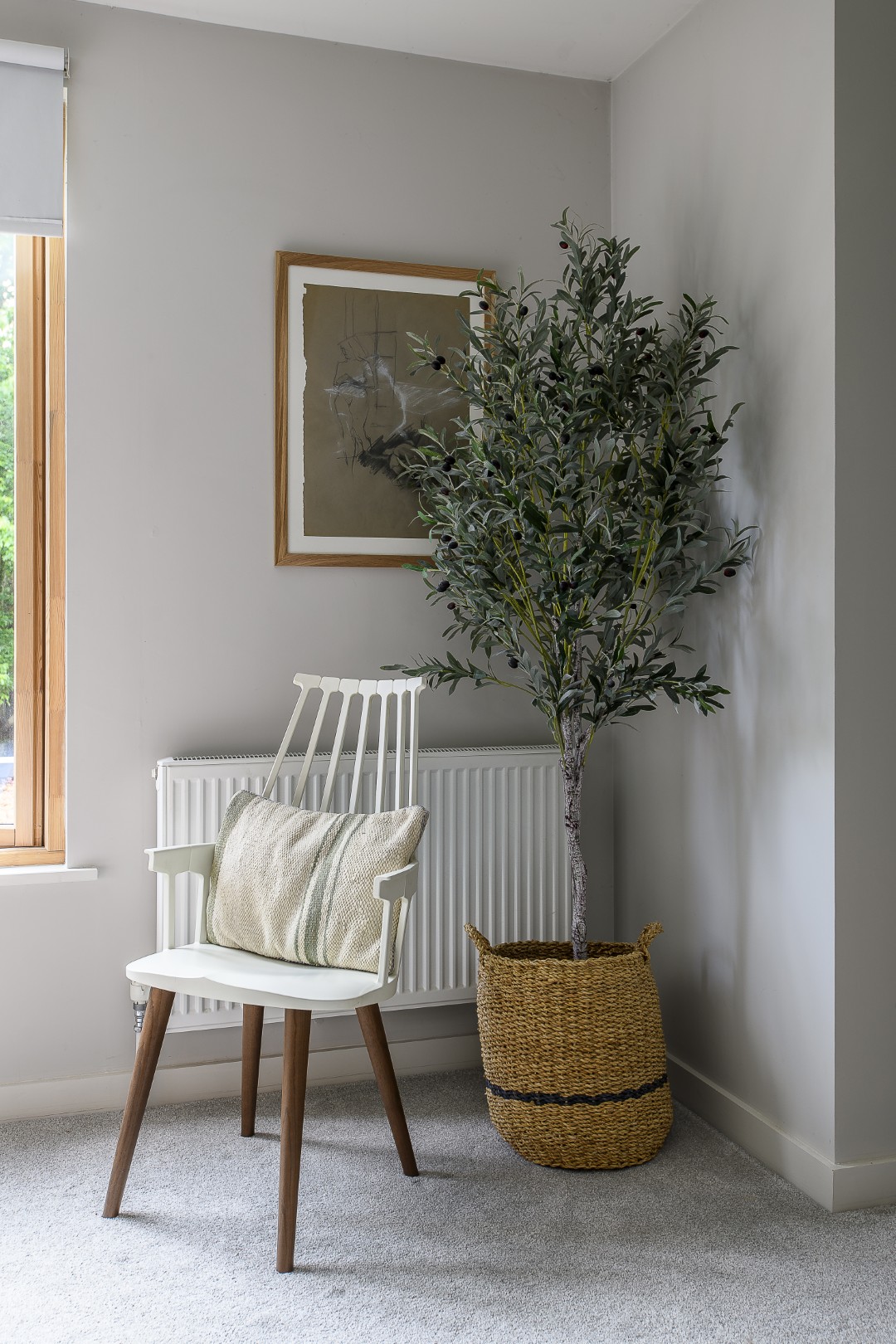Natural wood, textured fabrics and unfussy furniture add to the Scandi feel of this room
