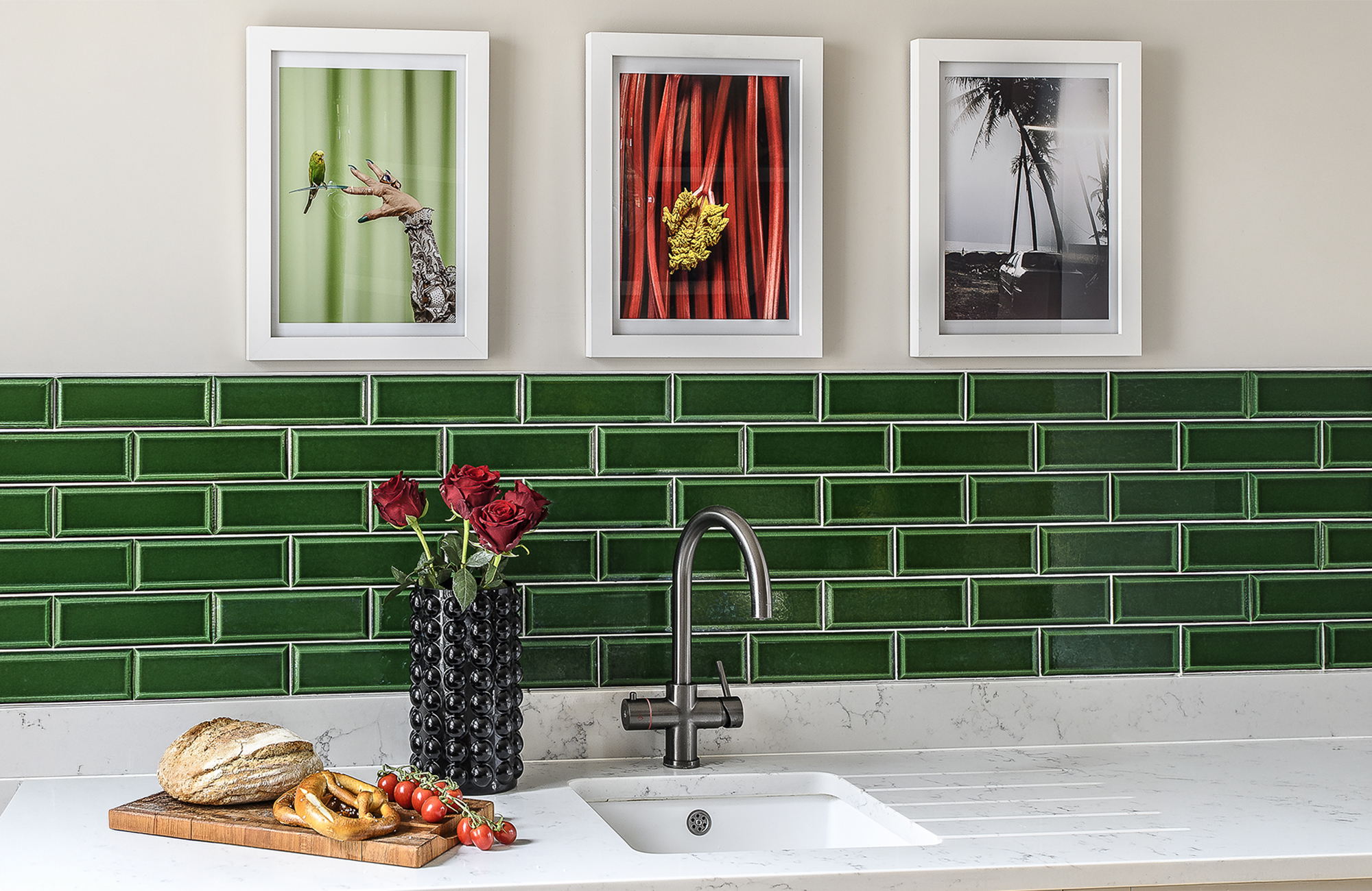 Above the kitchen sink, three photographs take centre stage, including one by Patrick’s friend Patricia Niven