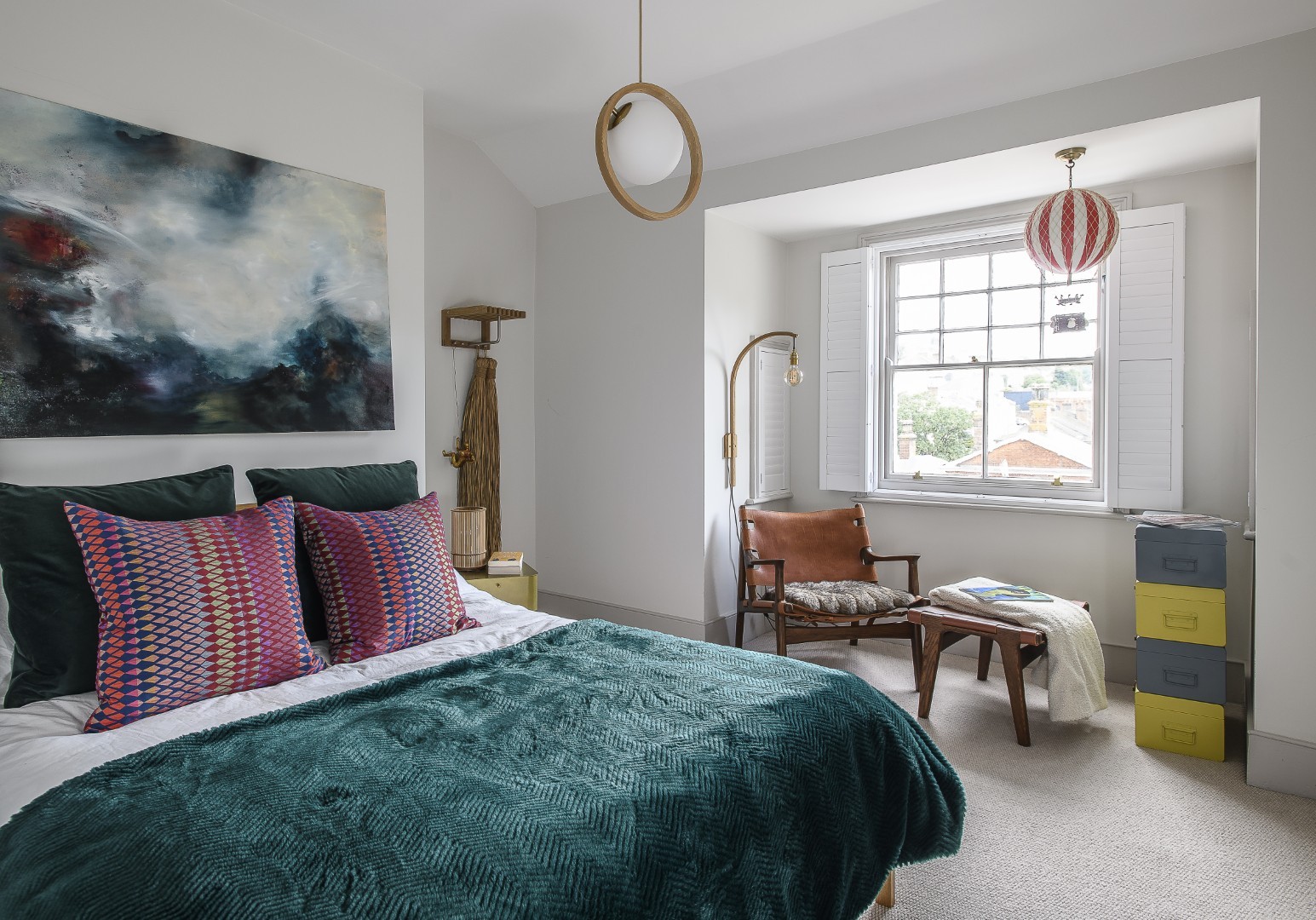 The tranquil and private guest bedroom, right at the top of the apartment.