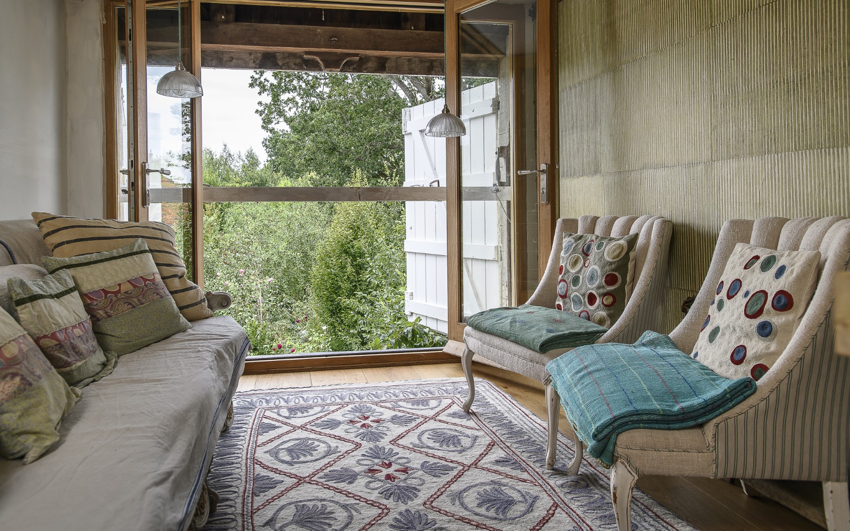 The original first floor hop loading bay now serves as a tranquil seating area with views out over the garden