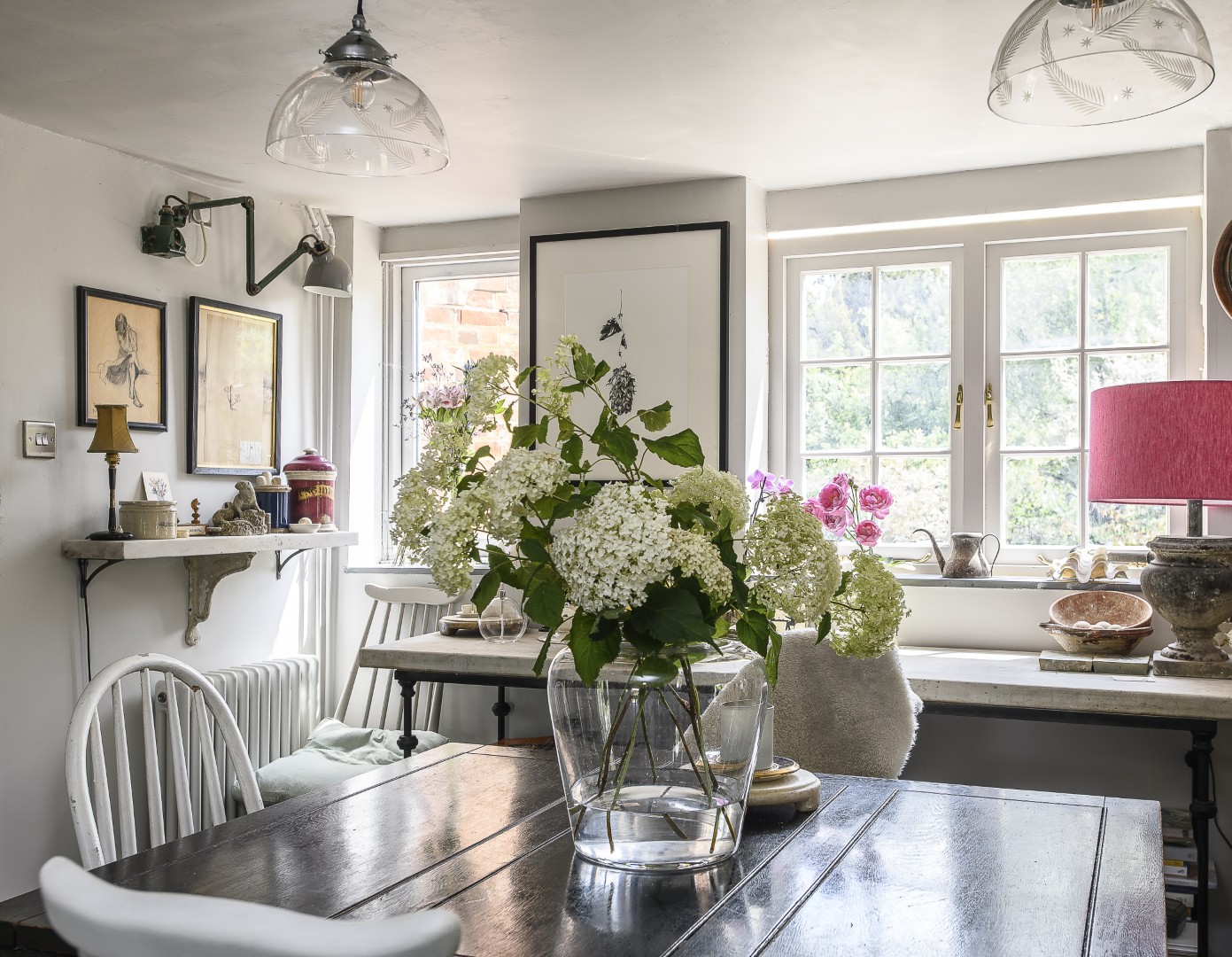 Around the corner from the kitchen, the dining room overlooks the garden to the rear.